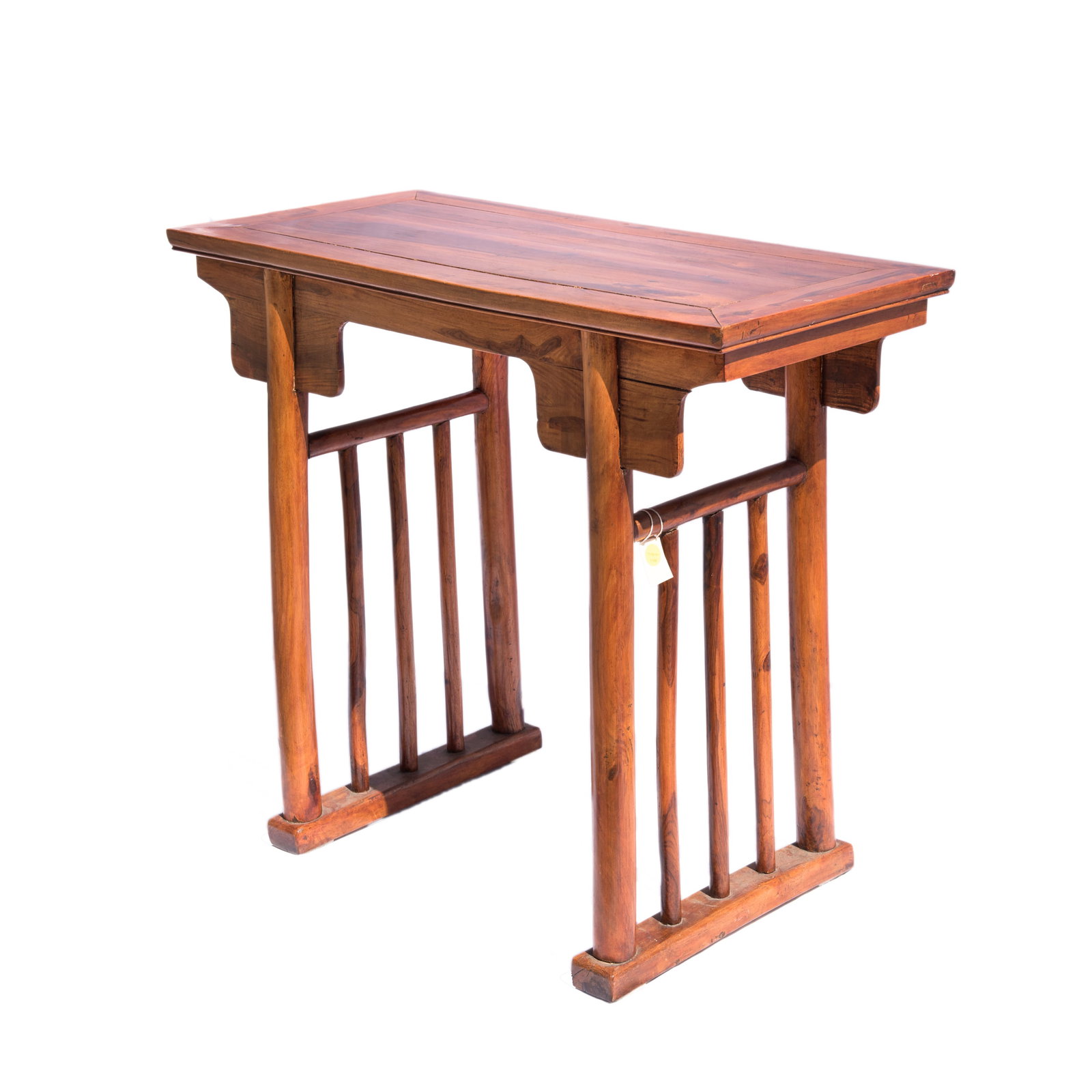 HAINAN HUANGHUALI TABLE, PINGTOU'AN, 19TH/20TH CENTURY (Y): Hainan huanghuali table, pingtou'an, 19th/20th century. The long single-panel top is set within a wide frame with an ice-plate edge. 31.50"h x 17.13"w x 34.65"l (80 x 43.5 x 88 cm) Provenance: From