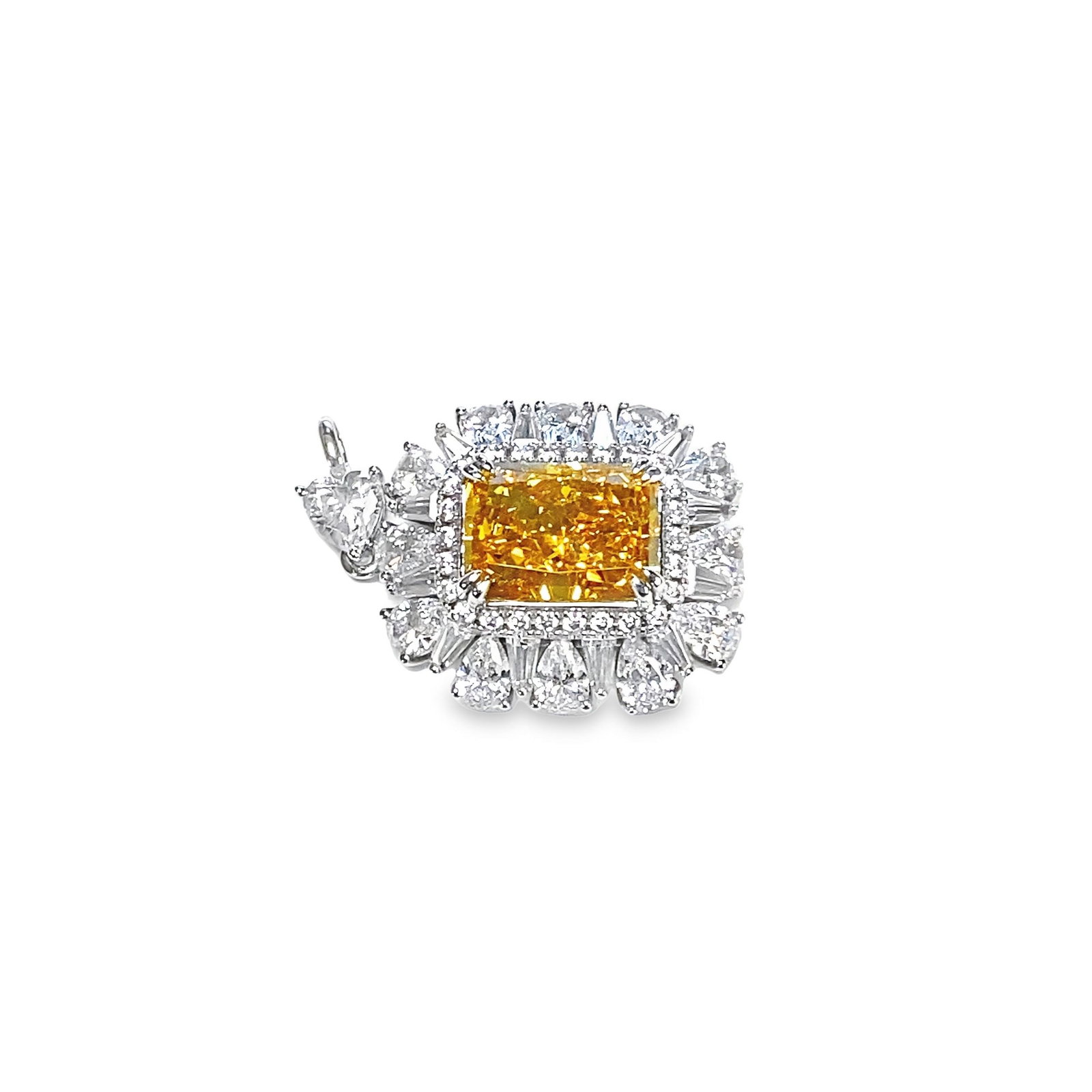 A FANCY YELLOW GEMSTONE FASHION JEWELRY PENDANT: A fancy yellow gemstone fashion jewelry pendant. Main stone: 0.55 x 0.39 in (1.4 x 1 cm)