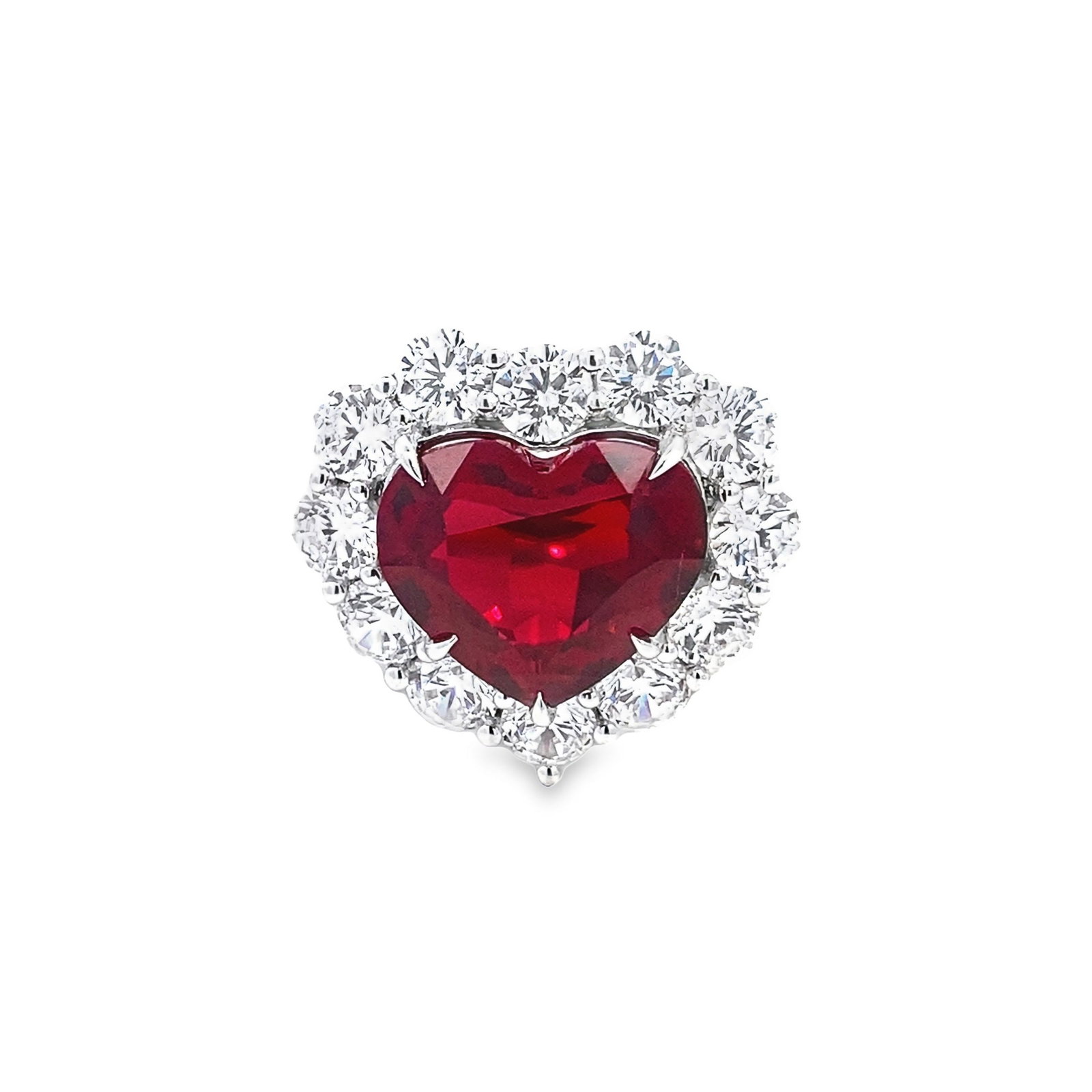 A HEART-SHAPED RUBY-RED GEMSTONE FASHION JEWELRY RING: A heart-shaped ruby-red gemstone fashion jewelry ring. Size: 5.75 7.552 ct