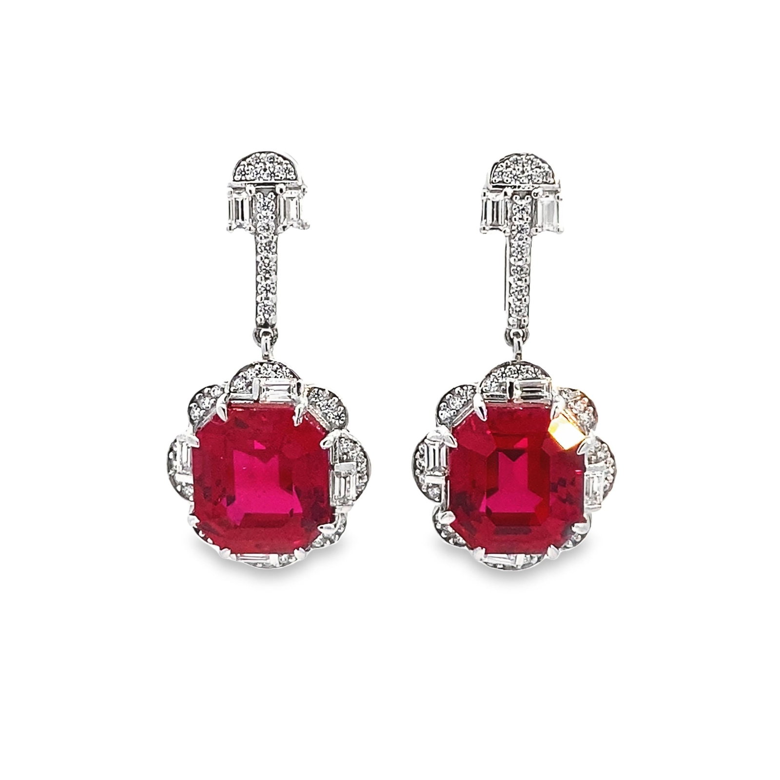 LAB RUBY AND DIAMOND EARRINGS OVER STERLING SILVER: Lab ruby and diamond earrings over sterling silver. Weight: 5.6 carats Main stone: 0.43"h x 0.35"w (1.1 x 0.9 cm)