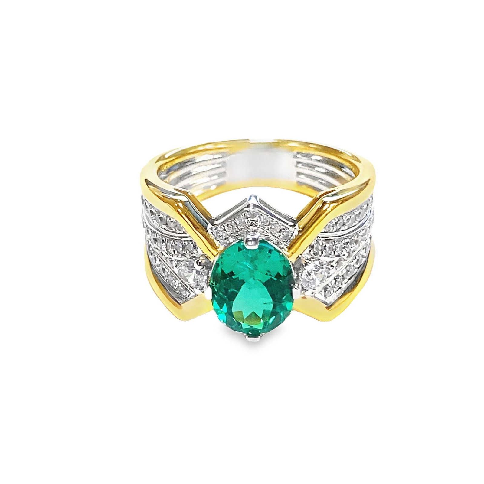 LAB EMERALD AND DIAMOND RING: Lab emerald and diamond ring with an oval-cut gemstone. Size: 10.5 3.29 ct