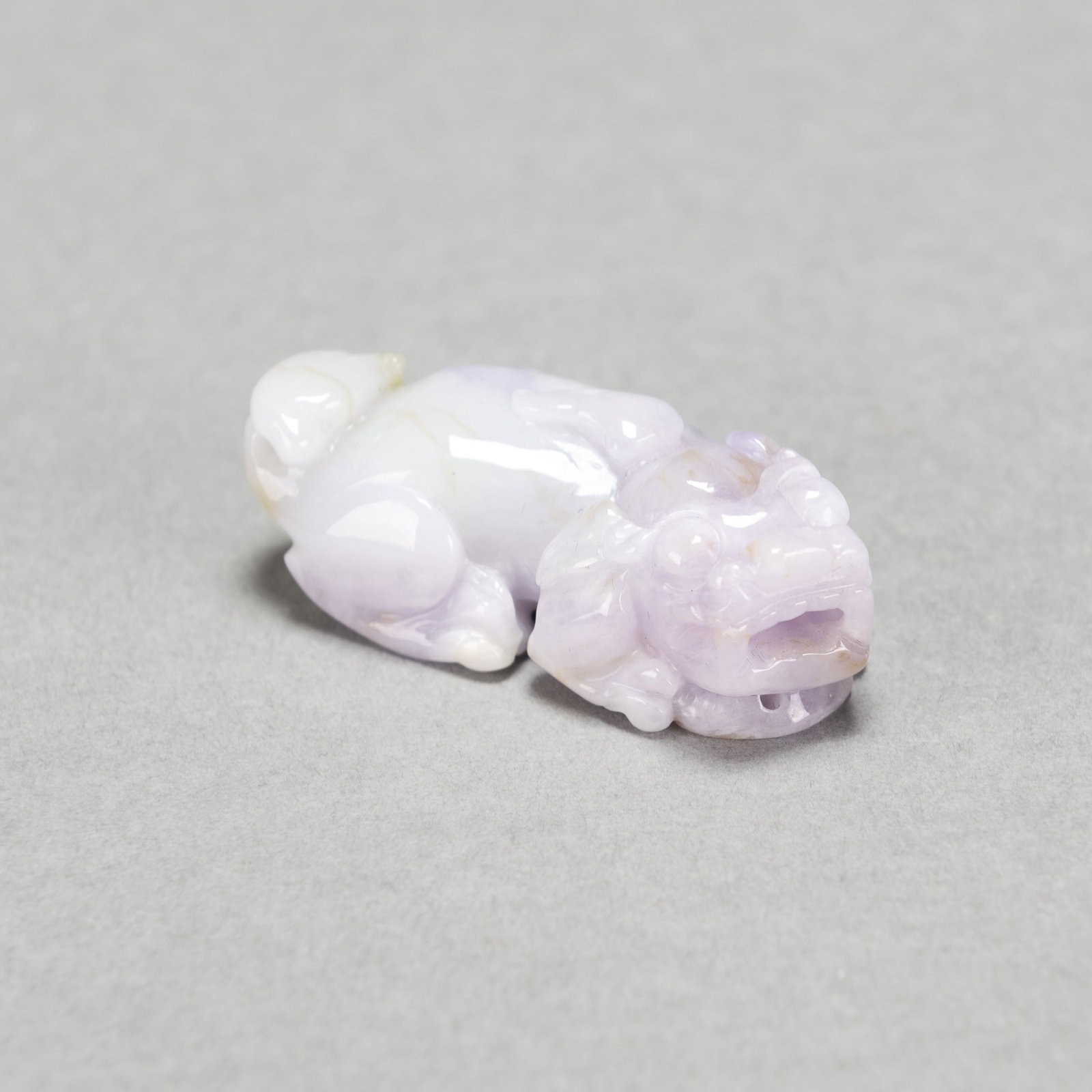 A CHINESE LAVENDER JADEITE ORNAMENT (1 of 5)