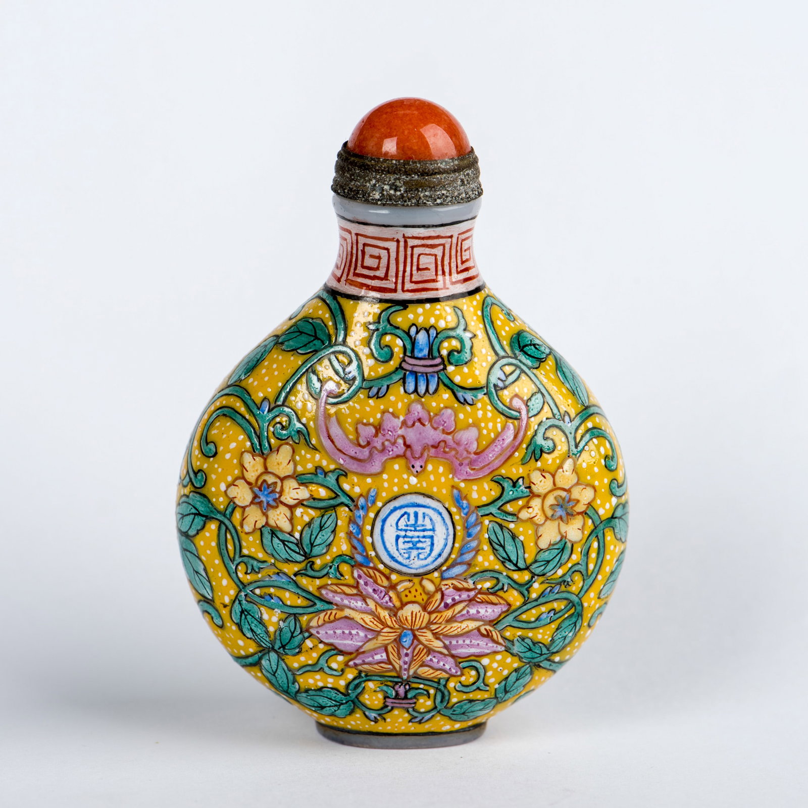 A FAMILLE-ROSE 'FLOWER' SNUFF BOTTLE: A famille-rose 'flower' porcelain snuff bottle. 2.56"h x 1.77"w (6.5 x 4.5 cm)