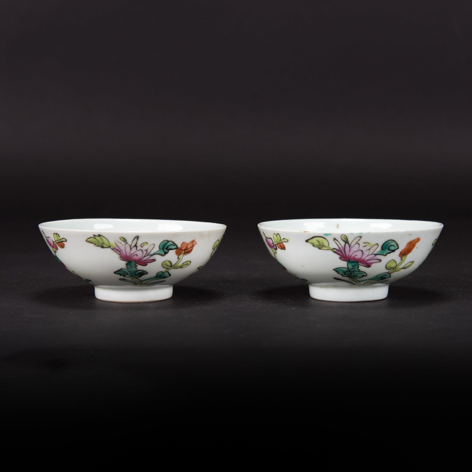 (LOT OF 2) A GROUP OF TWO FAMILLE-ROSE 'LOTUS' BOWLS, REPUBLIC PERIOD: (lot of 2) A group of two famille-rose 'lotus' bowls, Republic period. 1.77"h x 4.72"d (4.5 x 12 cm) (x2)
