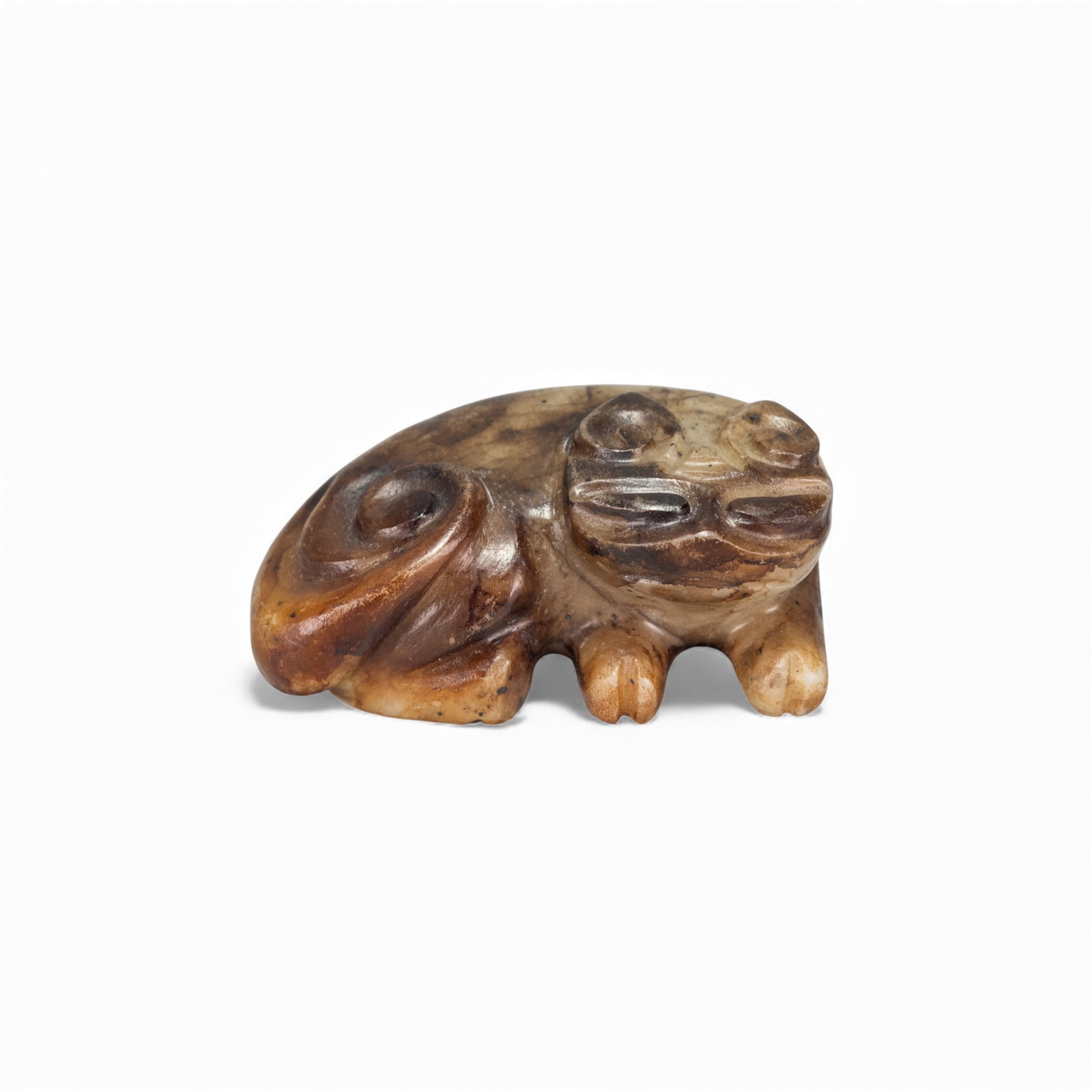CHINESE CARVED JADE ANIMAL, POSSIBLY HAN DYNASTY: Chinese carved jade animal, possibly Han dynasty. 0.98"h x 1.38"w x 2.17"l (2.5 x 3.5 x 5.5 cm)