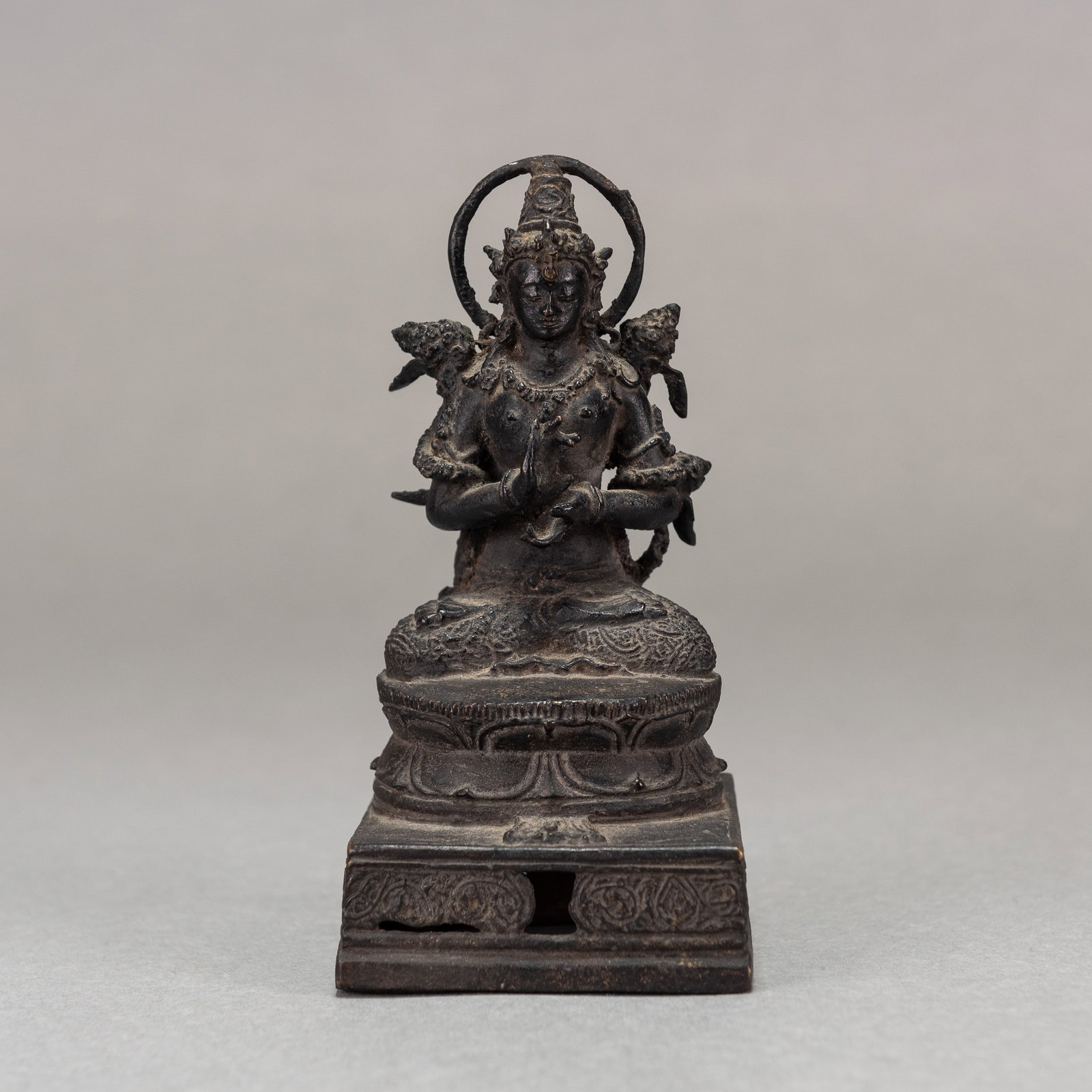 ASIAN BRONZE STATUE OF A DEITY, 19TH CENTURY: Asian bronze statue of a deity, 19th century. 5.53"h (14 cm)