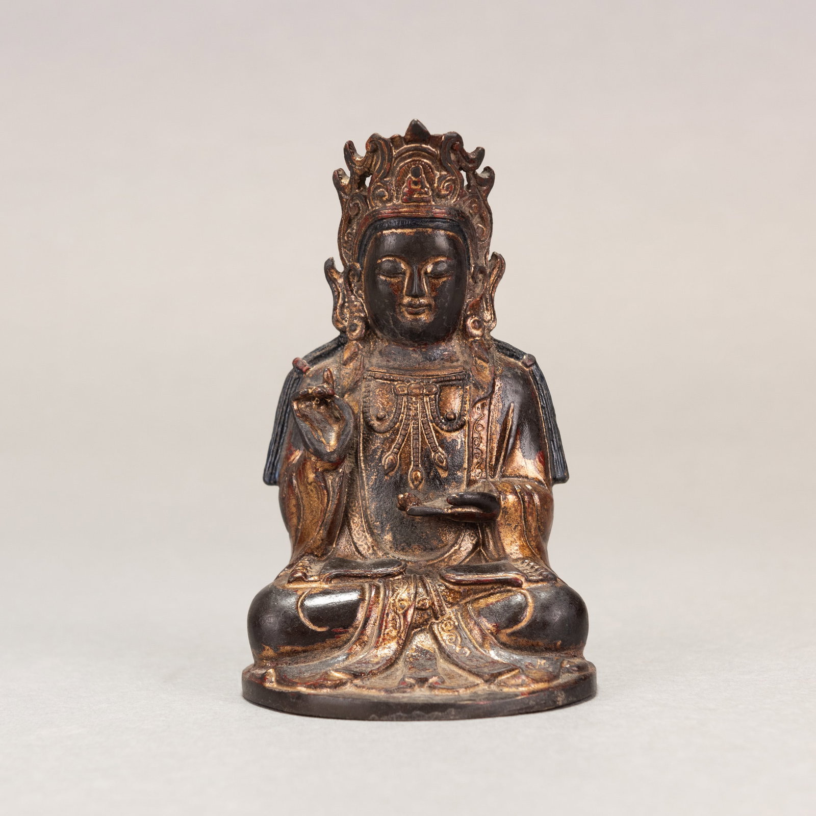 CHINESE GILT-BRONZE BODHISATTVA: Chinese gilt-bronze Bodhisattva. 5.51"h x 3.54"w x 3.35"l (14 x 9 x 8.5 cm)