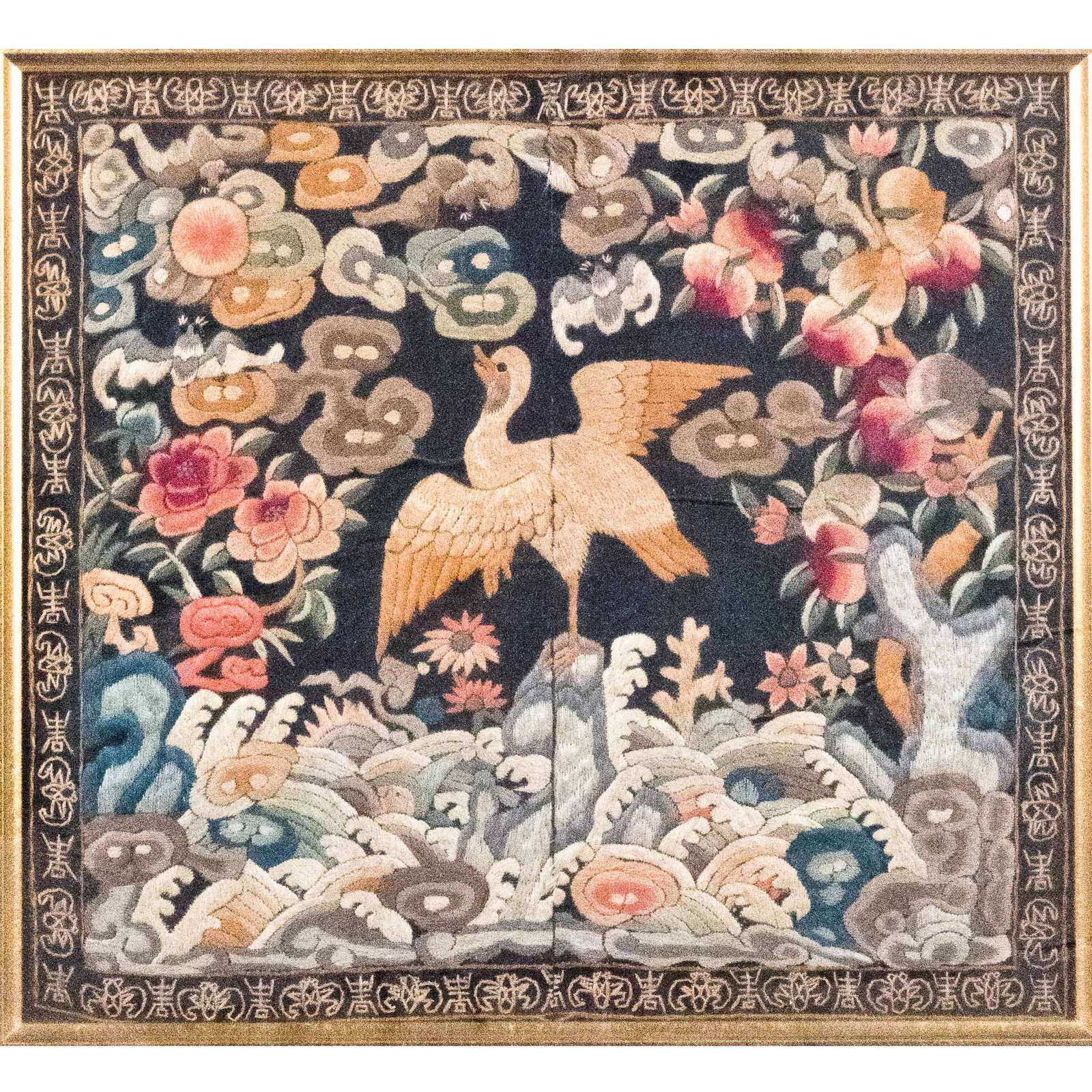 CHINESE EMBROIDERY WITH FRAME: Chinese embroidery with a black background, decorated with a crane motif. 11.81"h x 11.02"w (30 x 28 cm)