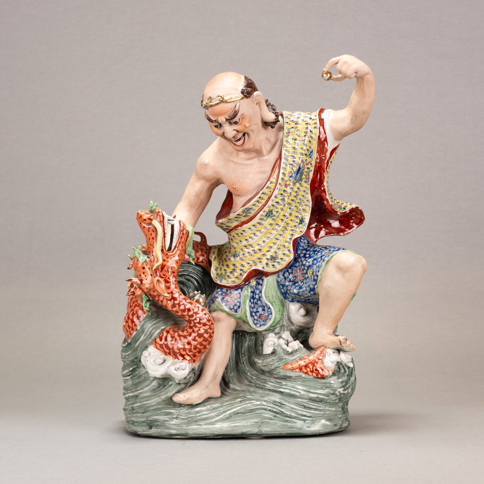 CHINESE PORCELAIN LUOHAN: Chinese porcelain Luohan. 18.11"h x 14.17"w x 10.24"l (46 x 36 x 26 cm)