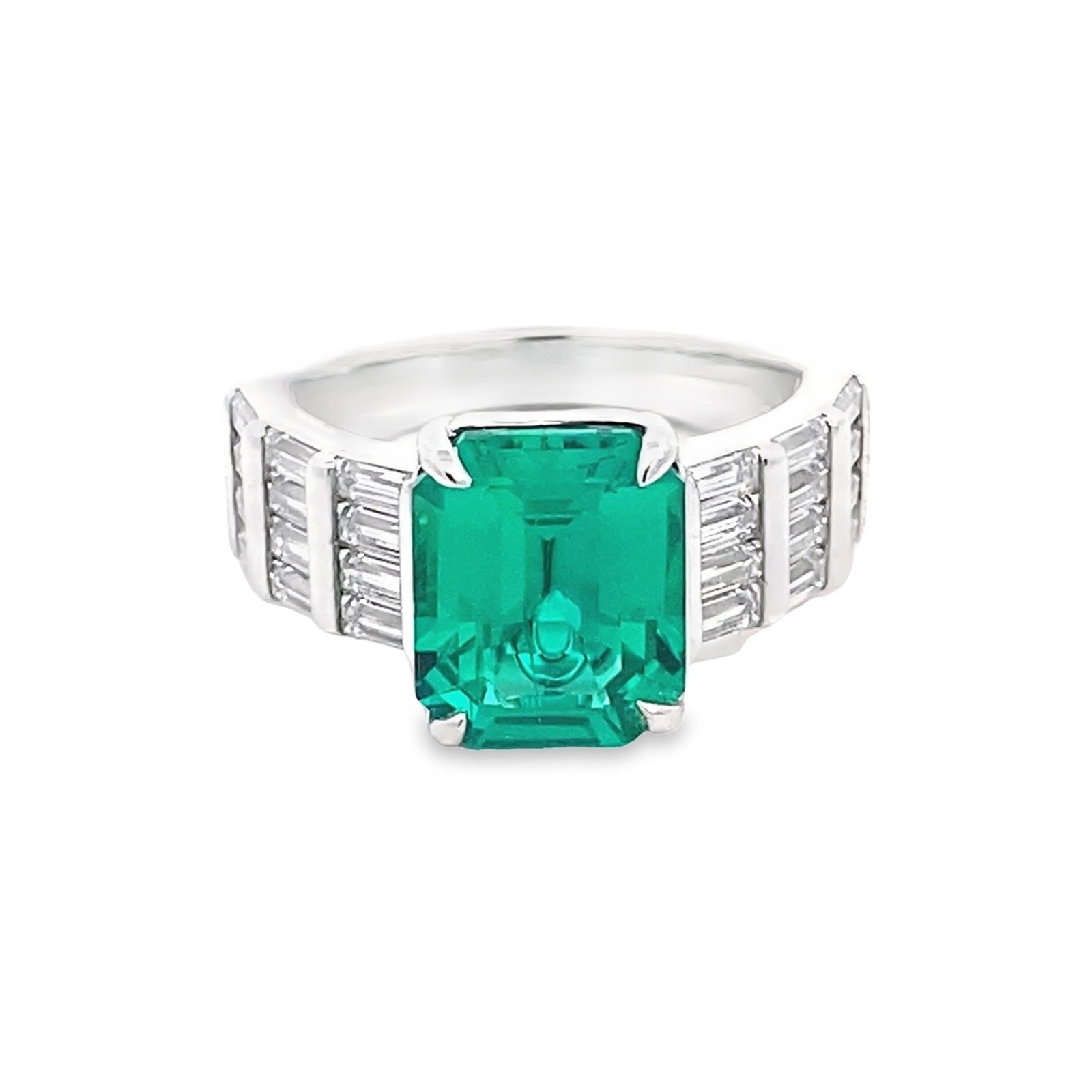 AN EMERALD-CUT GEMSTONE FASHION JEWELRY RING: An emerald-cut gemstone fashion jewelry ring. Size: 6.5 1.53 ct