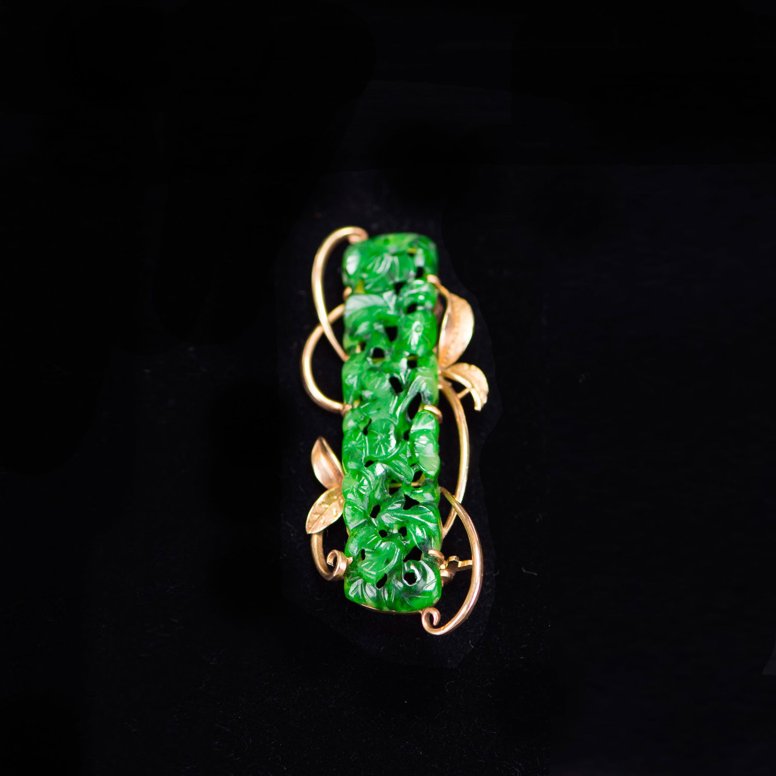 A JADEITE AND 14K GOLD BROOCH (1 of 5)