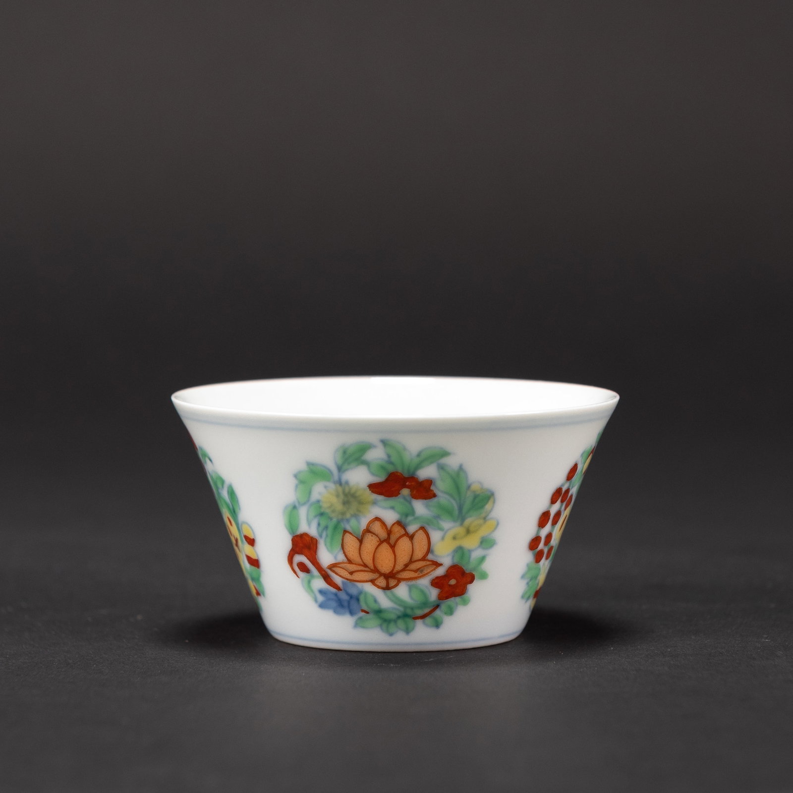 A DOUCAI 'FLORAL' CUP, CHENGHUA MARK: A doucai 'floral' cup, Chenghua mark. H4 x 8 cm