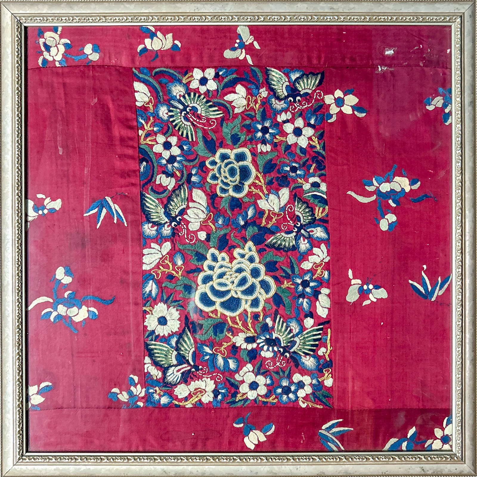 CHINESE EMBROIDERY OF FLOWERS AND BUTTERFLIES: Chinese embroidery of flowers and butterflies, framed. Image: 15.75"d (40 cm)