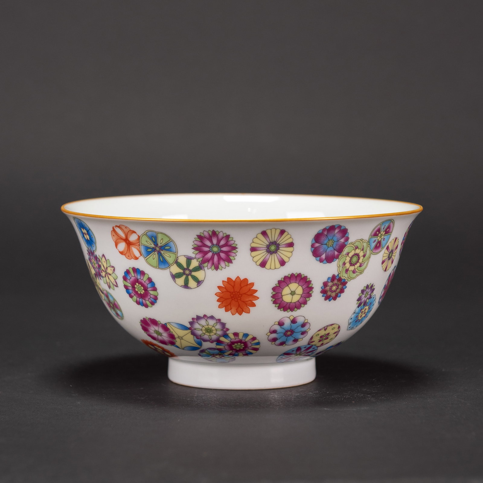A FAMILLE-ROSE 'MEDALLION' BOWL, YONGZHENG MARK: A famille-rose 'medallion' bowl, Yongzheng mark. 3.07"h x 6.3"d (7.8 x 16 cm)