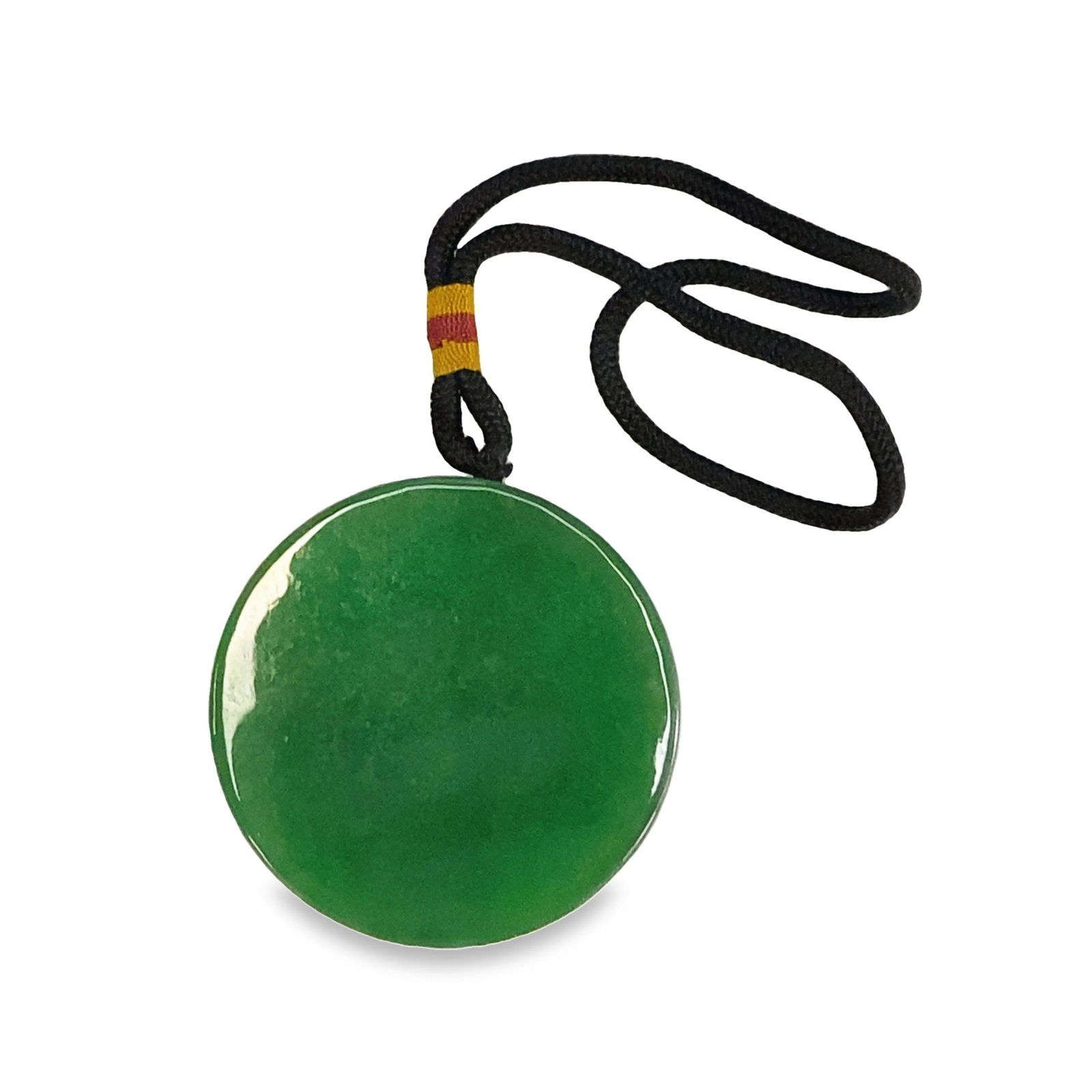 A CIRCULAR JADEITE PENDANT - 2