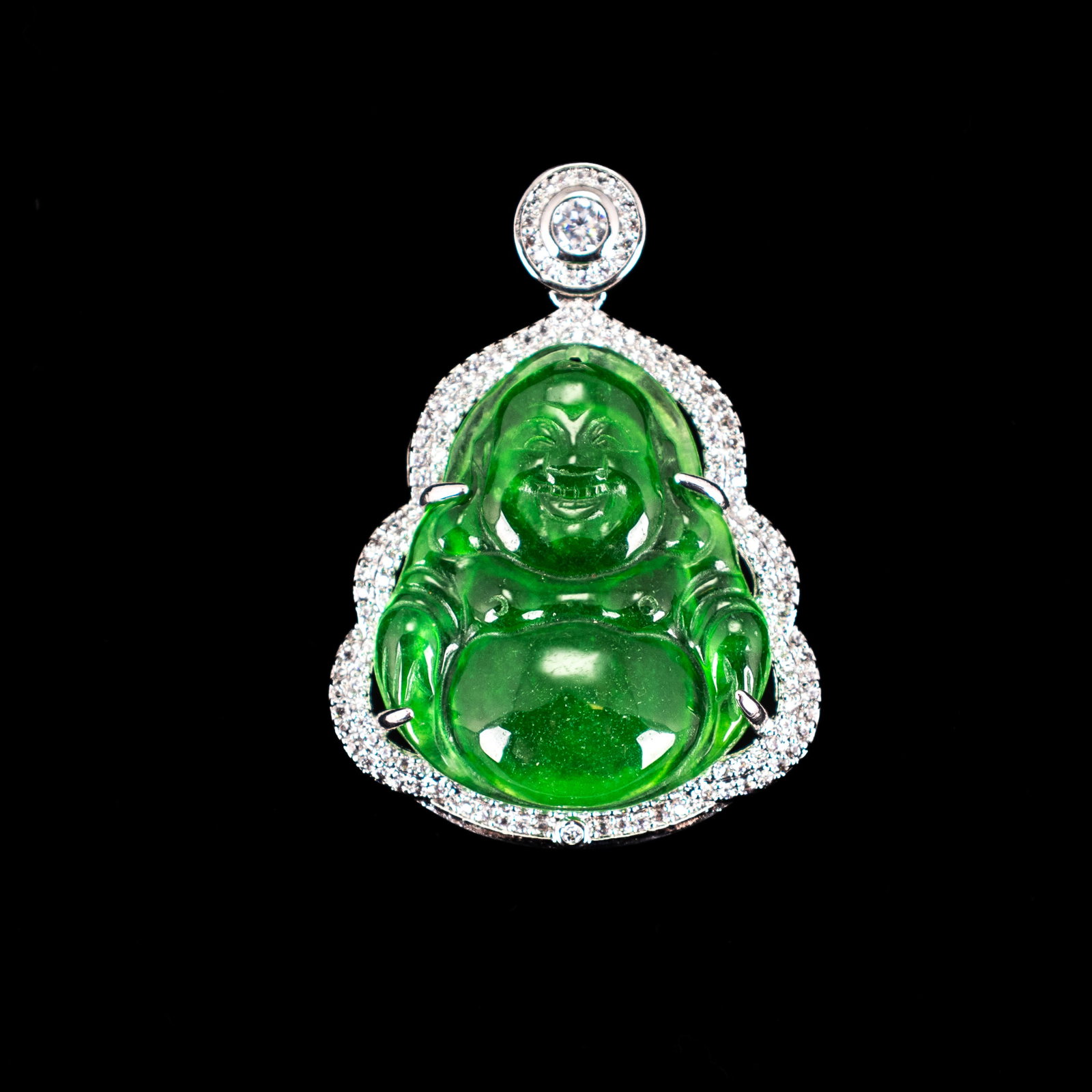 JADEITE, DIAMOND AND STERLING SILVER PENDANT: Jadeite, diamond and sterling silver pendant. 0.98"h x 0.79"w (2.5 x 2 cm)