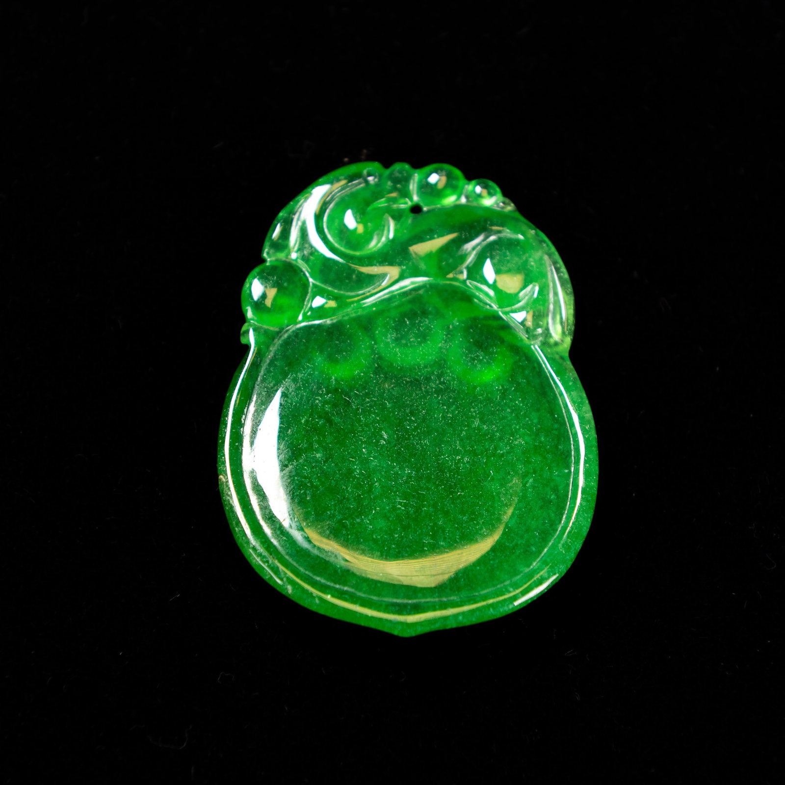 A JADEITE PENDANT - 4