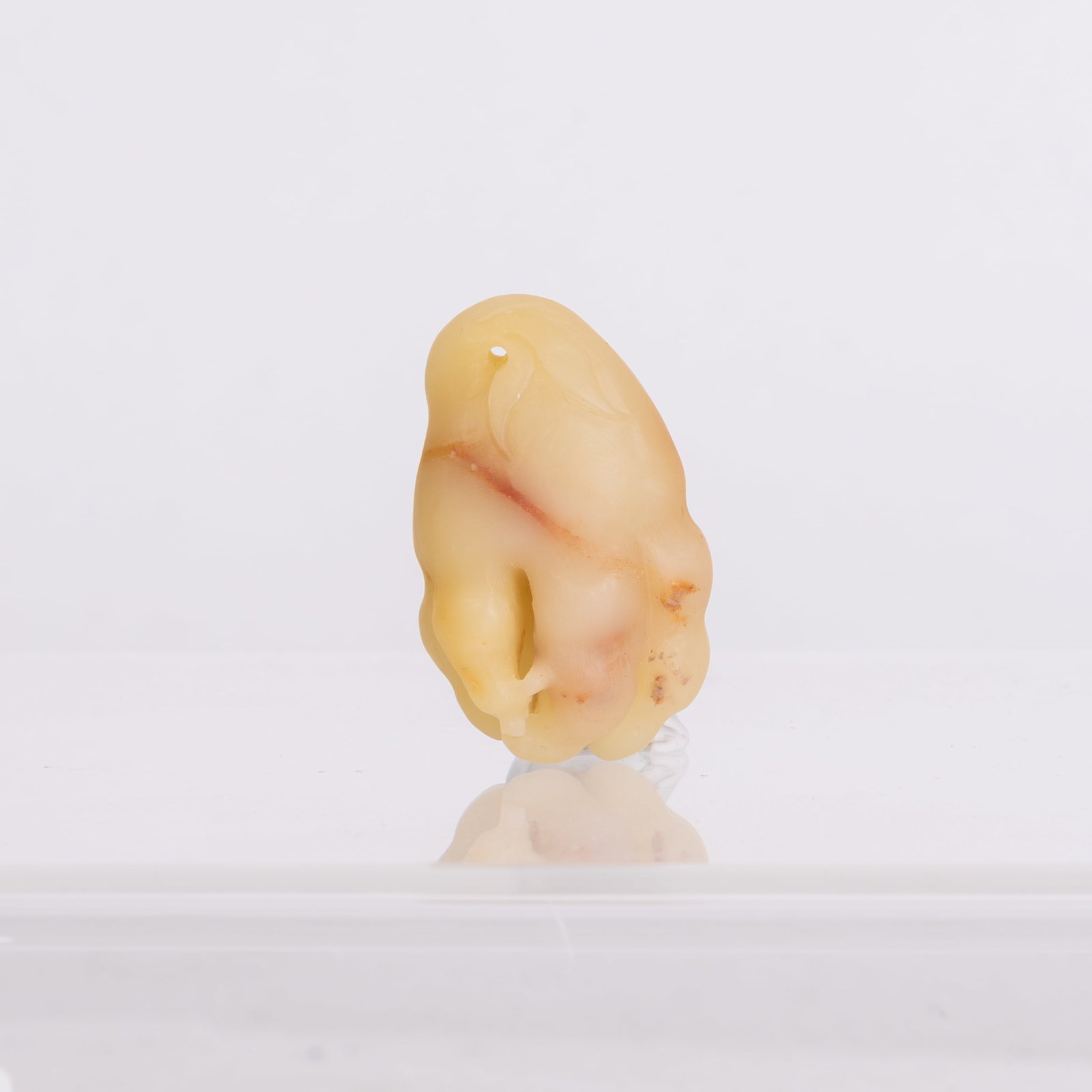 A SHOUSHAN STONE: A Shoushan stone. 2"h x 0.5"w x 1.5"l