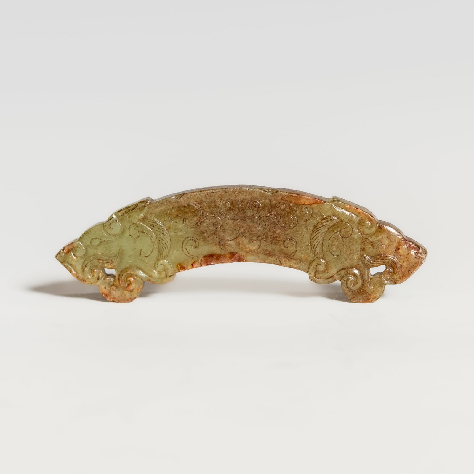 CHINESE CARVED RUSSET JADE PLAQUE: Chinese carved russet jade plaque. 3.94"h x 1.18"w x 0.24"l (10 x 3 x 0.6 cm)