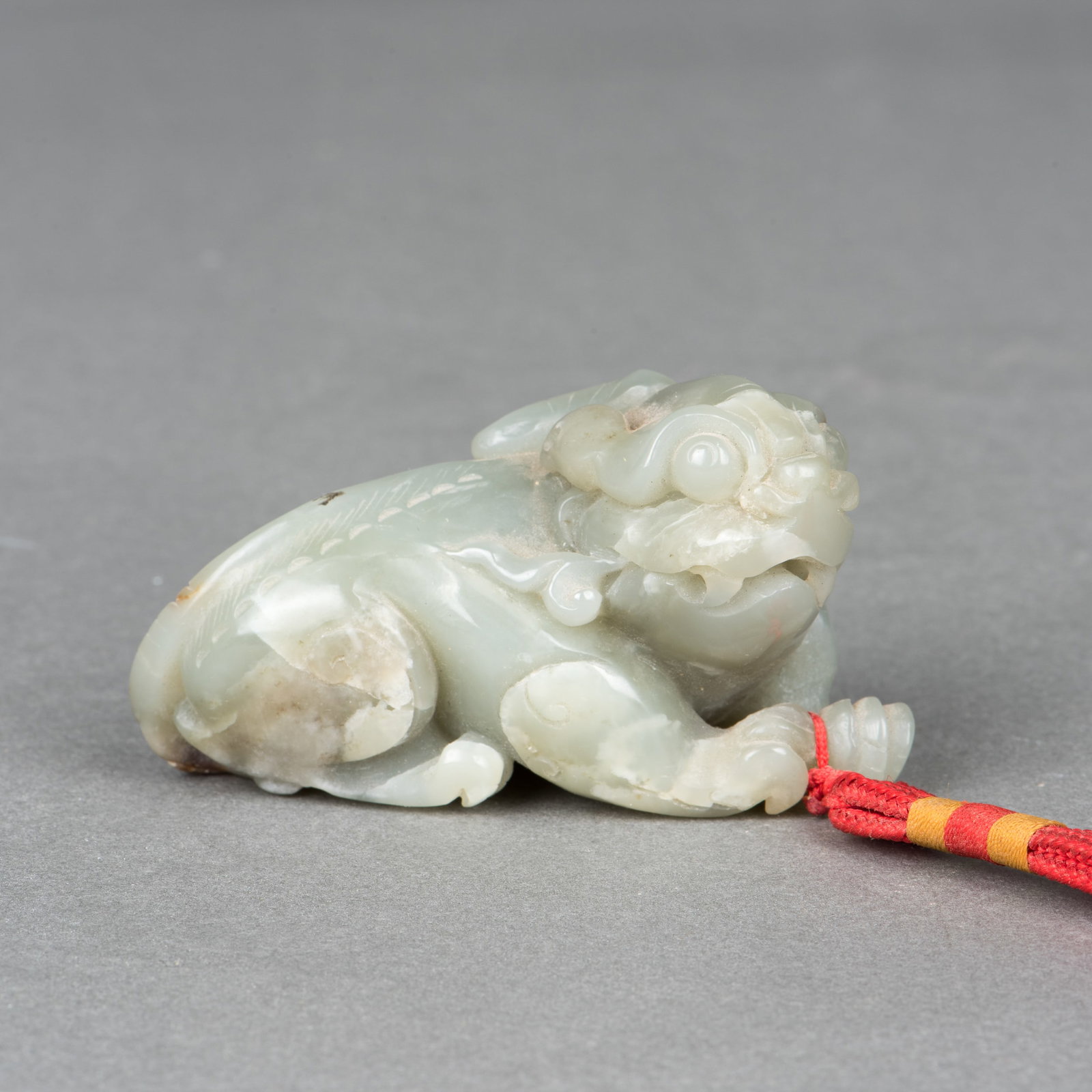 A JADE CARVING OF A CHILONG: A jade carving of a chilong. 4.5 x 8 x 4 cm