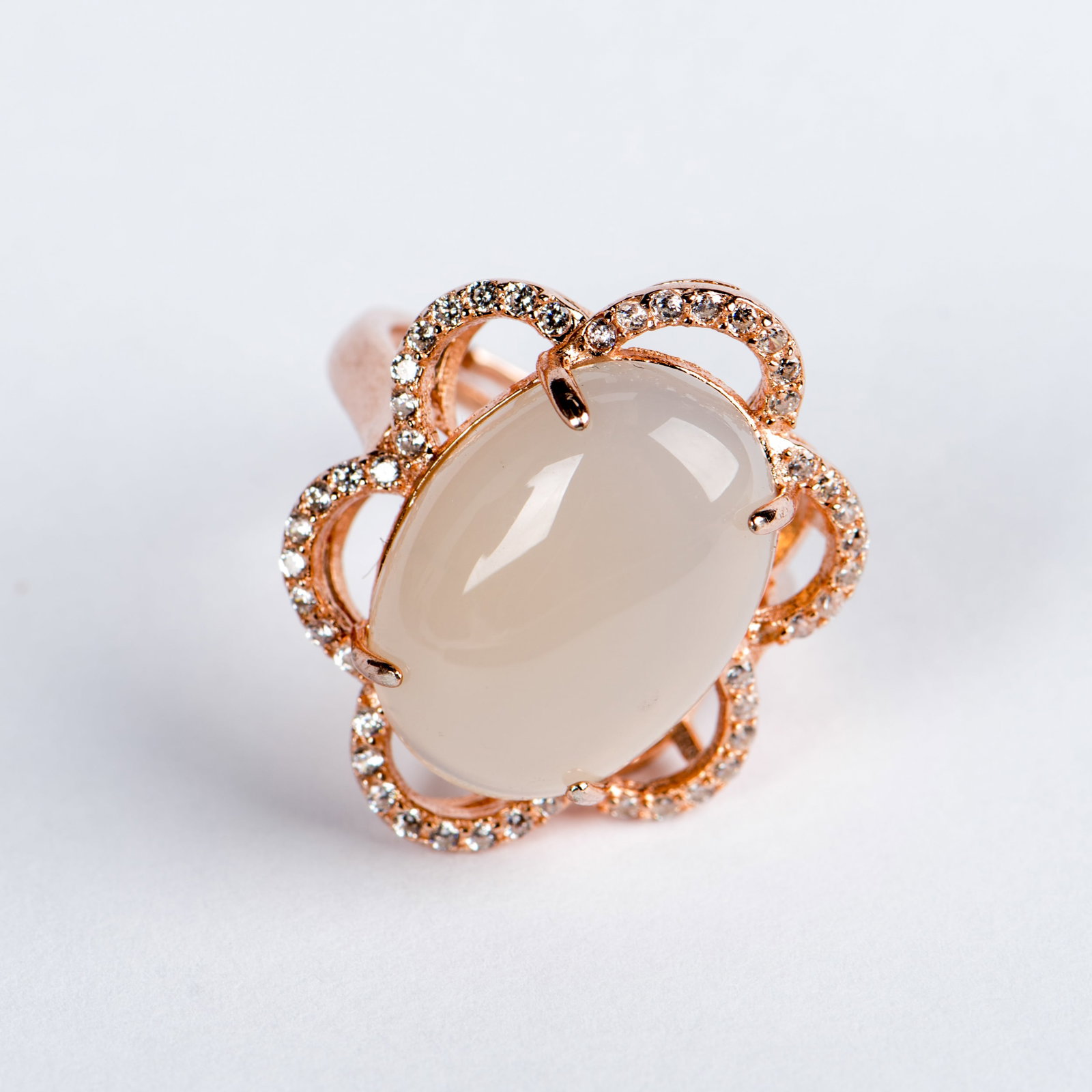 JADEITE AND DIAMOND RING: Jadeite and diamond ring. 0.7"h x 0.5"w (1.78 x 1.27 cm); Size: 7 (adjustable)
