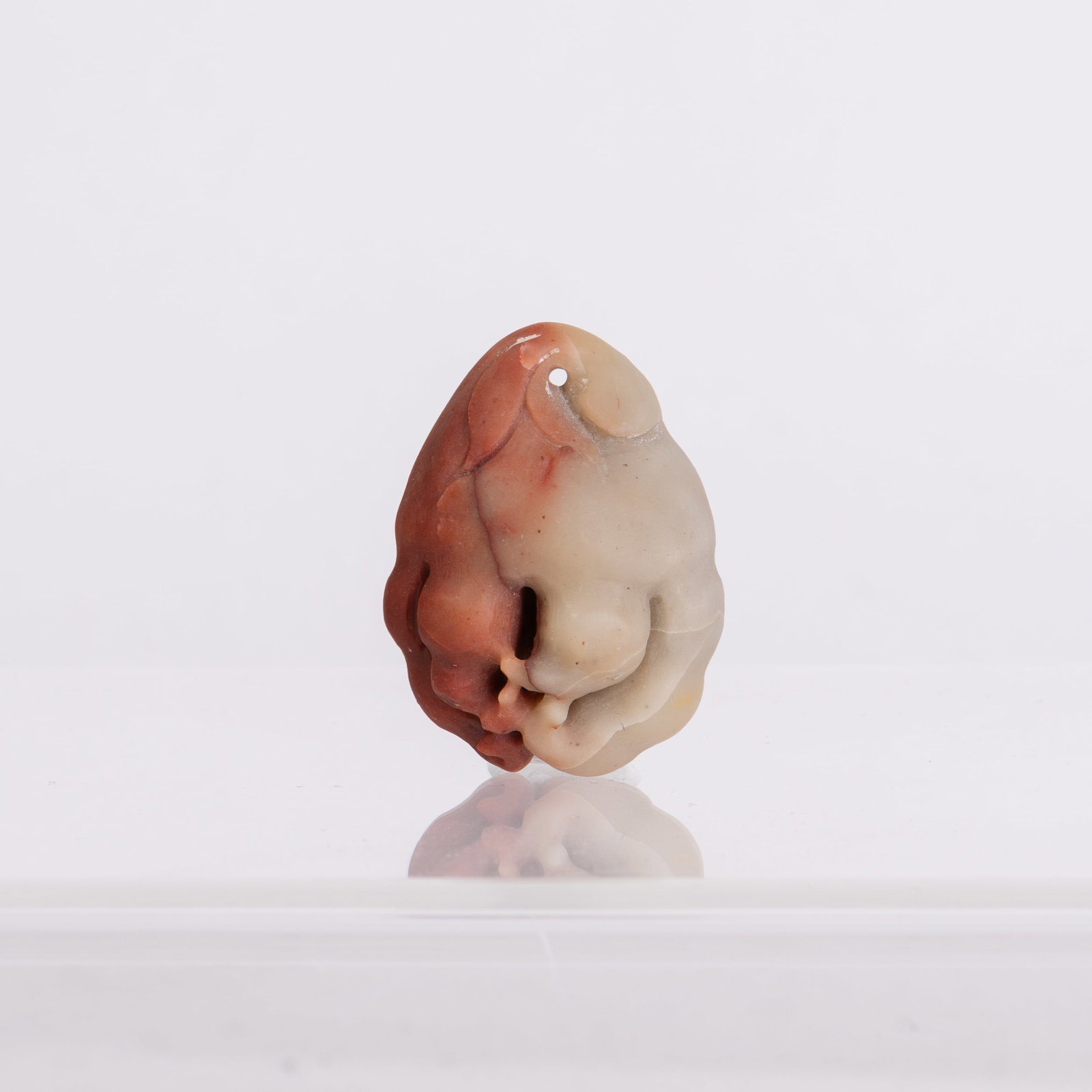A SHOUSHAN STONE: A Shoushan stone. 2"h x 0.5"w x 1.5"l