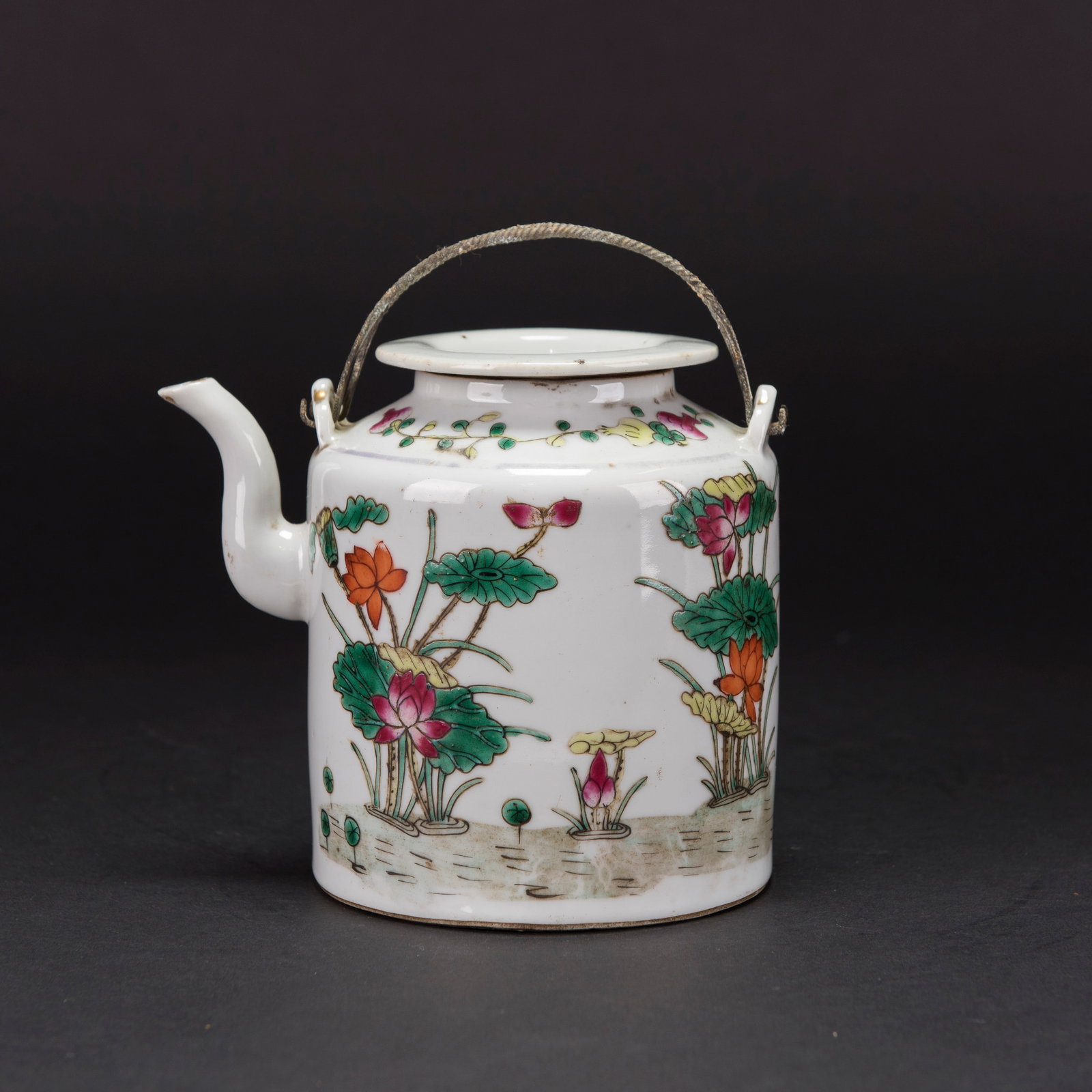 CHINESE FAMILLE-ROSE 'LOTUS' TEAPOT WITH COVER, REPUBLIC PERIOD: Chinese famille-rose 'lotus' teapot with cover, Republic period. 6.3"h x 5.91"w (16 x 15 cm)