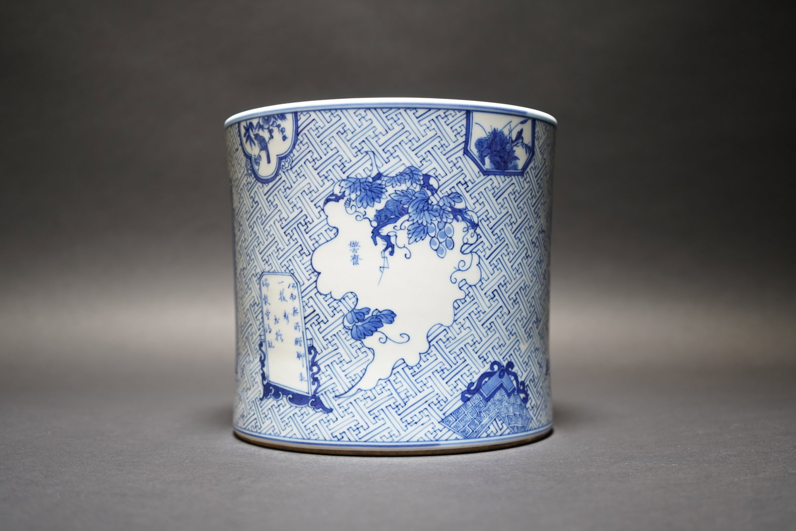 CHINESE BLUE-AND-WHITE BRUSH POT, XUANDE MARK: Chinese blue-and-white brush pot, Xuande mark. 6.69"h x 7.09"w (17 x 18 cm)