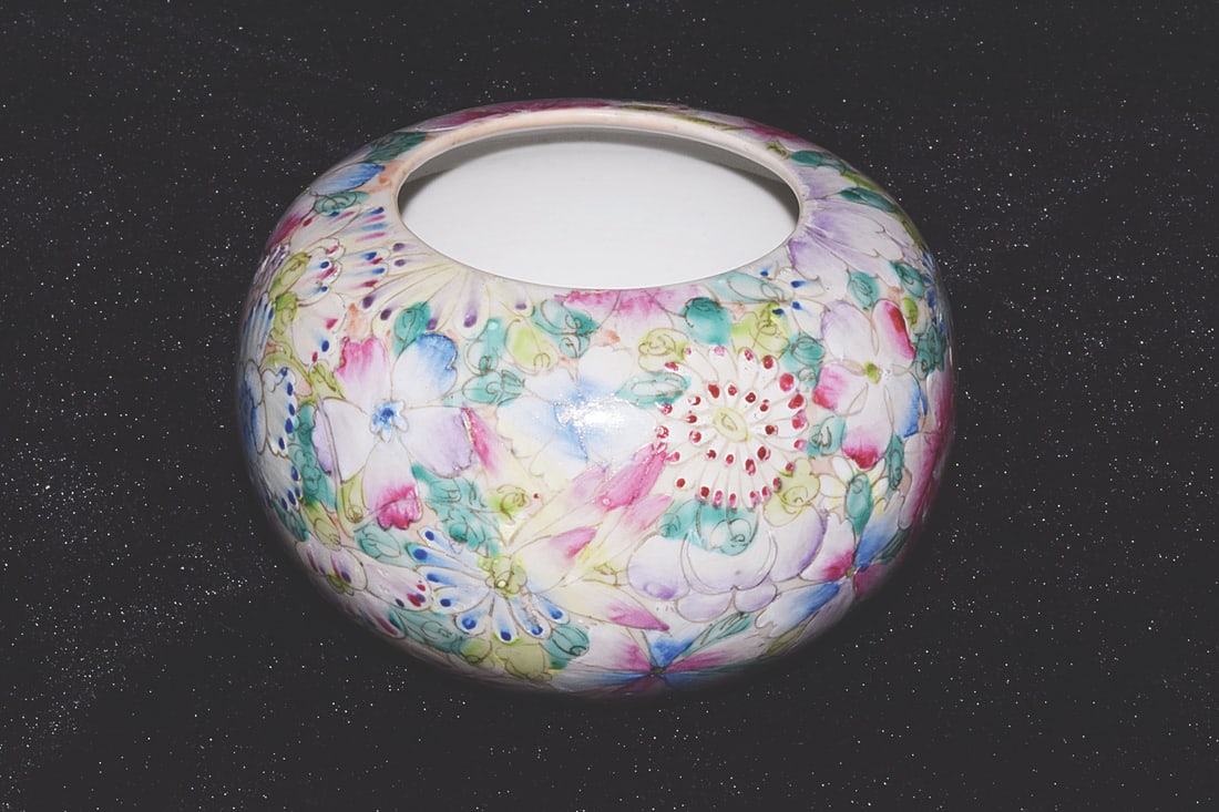 CHINESE FAMILLE-ROSE MILLEFLEURS BRUSH WASHER: Chinese famille-rose millefleurs brush washer of compressed rounded form, decorated with intertwined blossoms. 3.54"h x 5.12"d (9 x 13 cm)