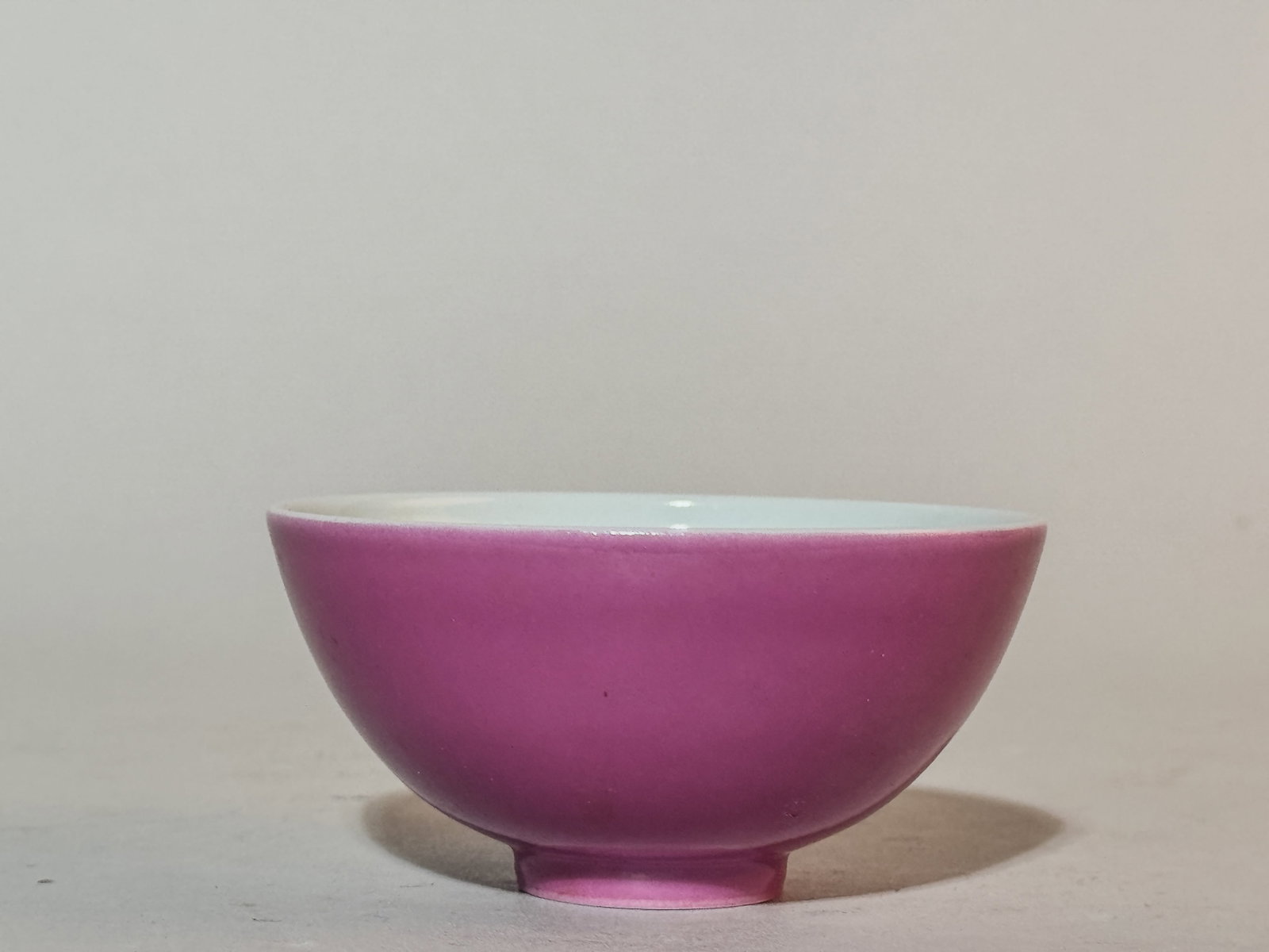 CHINESE PINK MONOCHROME PORCELAIN BOWL: A Chinese pink monochrome porcelain bowl. Dimensions: Diameter: 3.3 in. (8.4 cm). Note: This item is in New York, where it can be shipped from.