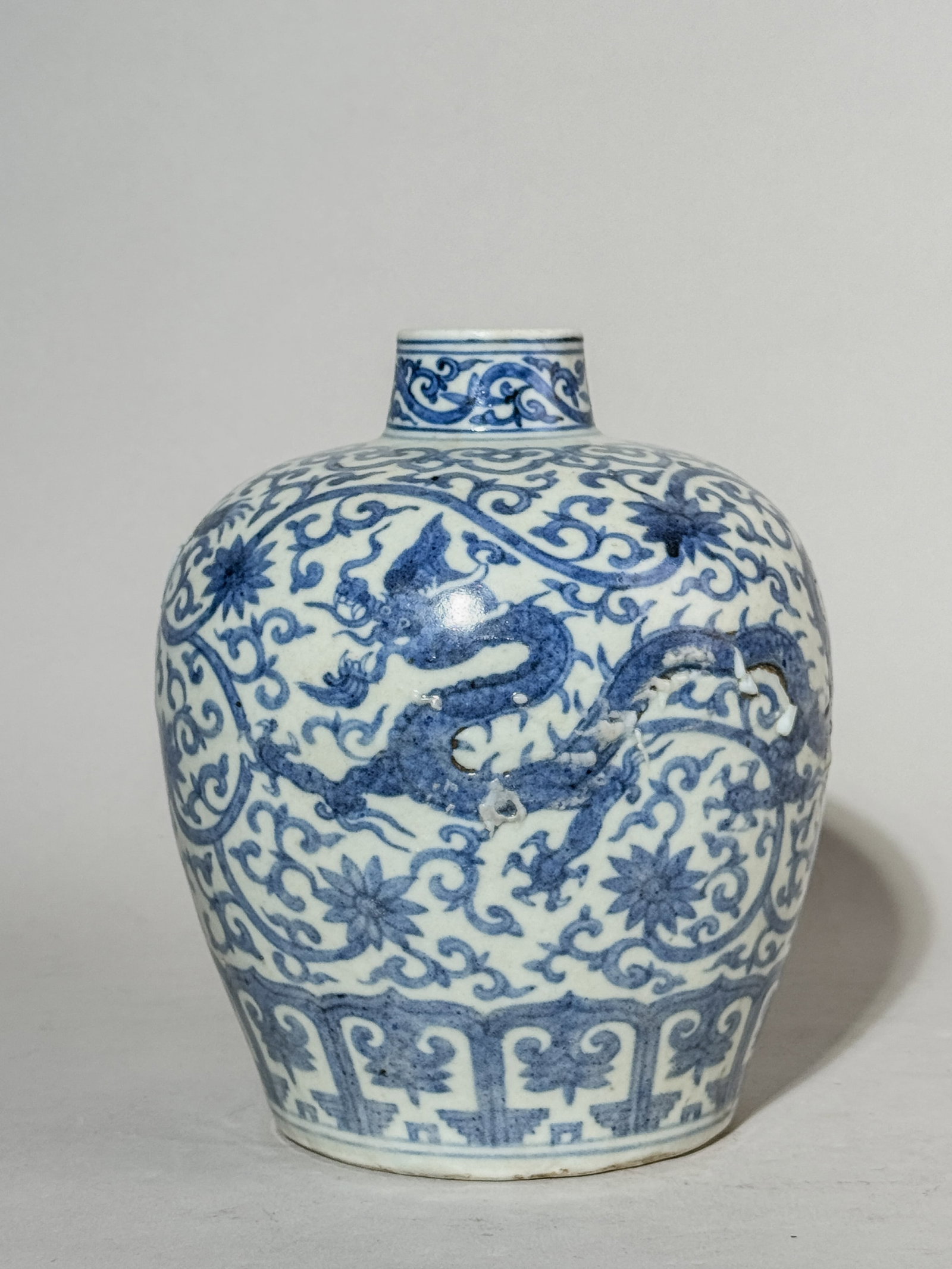 CHINESE BLUE AND WHITE PORCELAIN JAR WITH DRAGON: A Chinese blue and white porcelain jar with dragon motif, kiln flaws, and a Ming mark. Dimensions: Height: 7.5 in. (19.1 cm). Note: This item is in New York, where it can be shipped from.