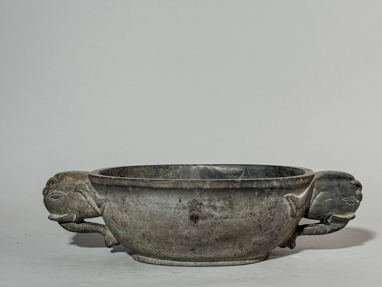 CHINESE DUAN STONE CENSER WITH ELEPHANT EAR: A Chinese Duan stone censer with elephant ear. Dimensions: Width: 8 in. (20.3 cm). Note: This item is in New York, where it can be shipped from.