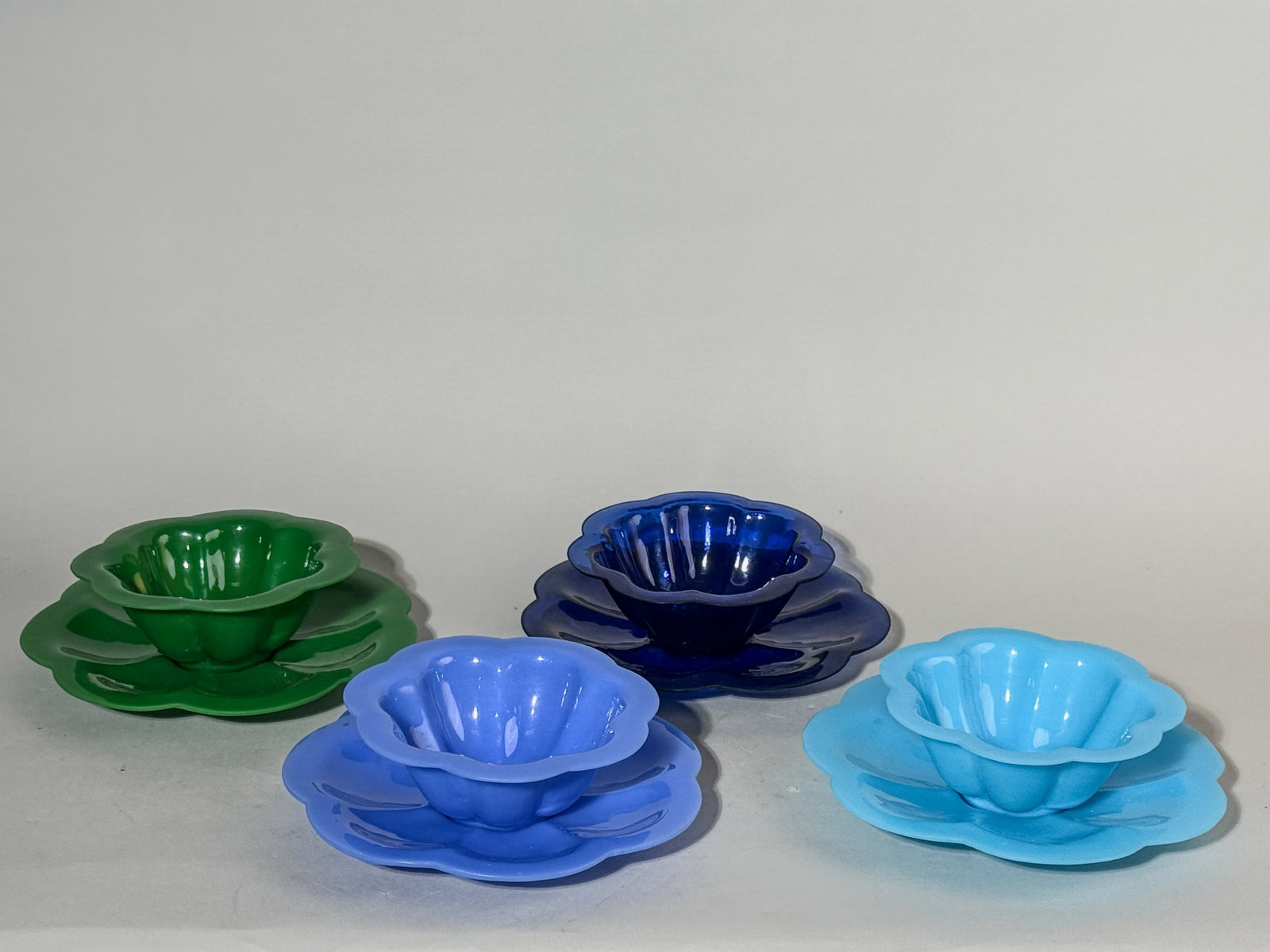 SET OF PEKING GLASS BOWLS: A set of eight Peking glass bowls and dishes. Dimensions: Largest Diameter: 7.5 in. (19.1 cm). Note: This item is in New York, where it can be shipped from.
