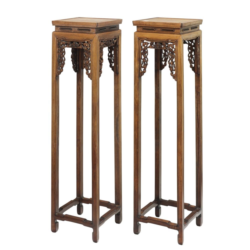 (LOT OF 2) PAIR OF CHINESE ROSEWOOD STANDS: (lot of 2) A pair of Chinese rosewood stands, each featuring bat motifs, late 19th/early 20th century. Each: 55.25"h x 13.75"w x 13.25"d