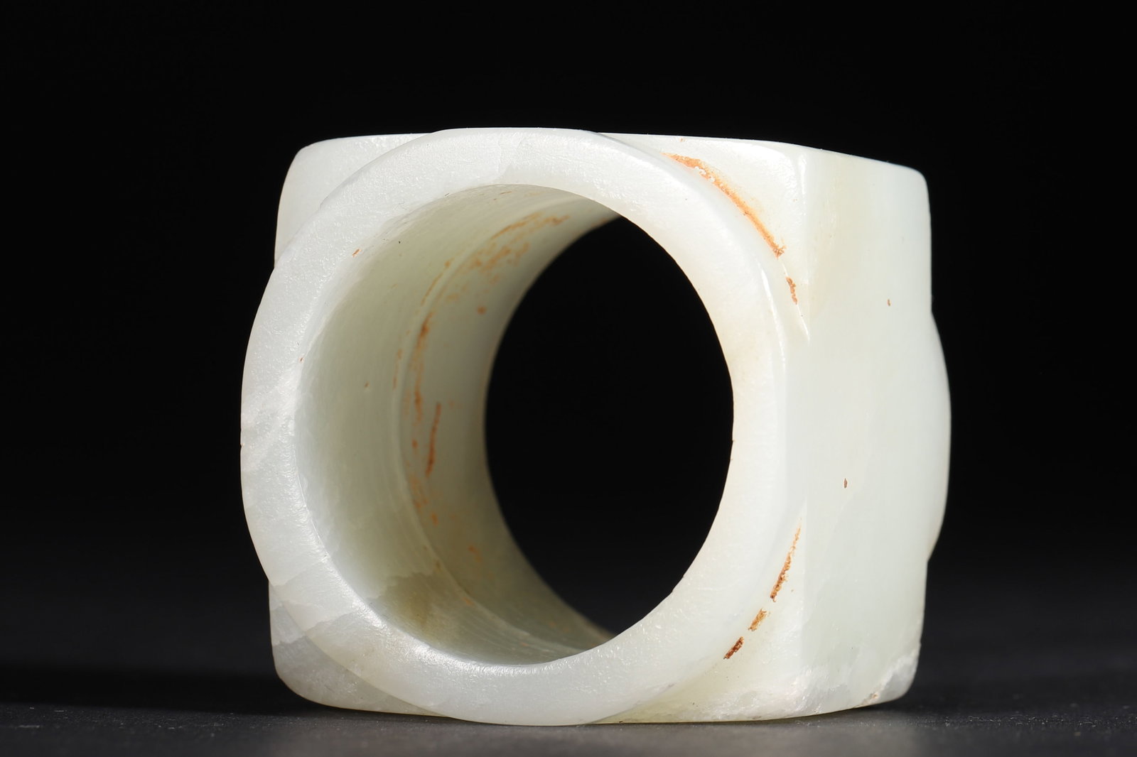 A WHITE JADE CONG-FORM THUMB RING - 6