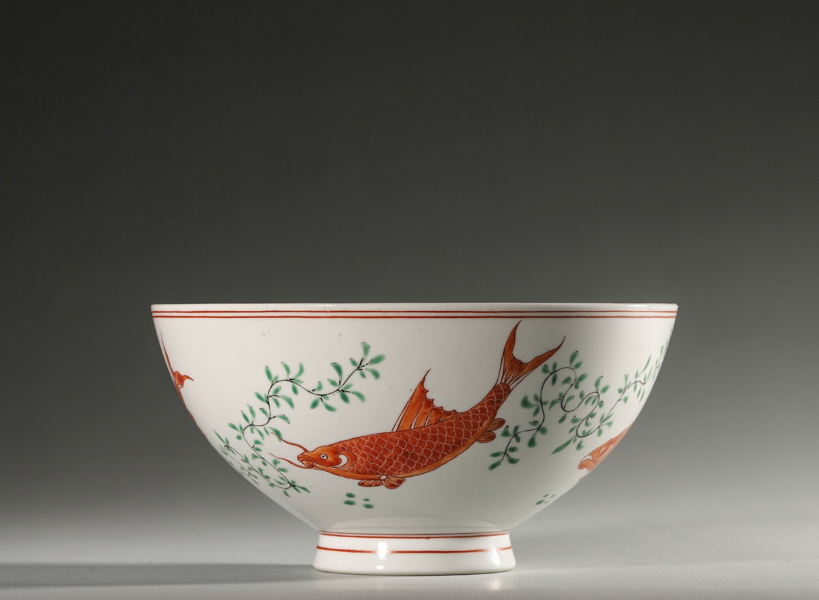 AN IRON-RED 'FISH AND ALGAE' BOWL (1 of 6)