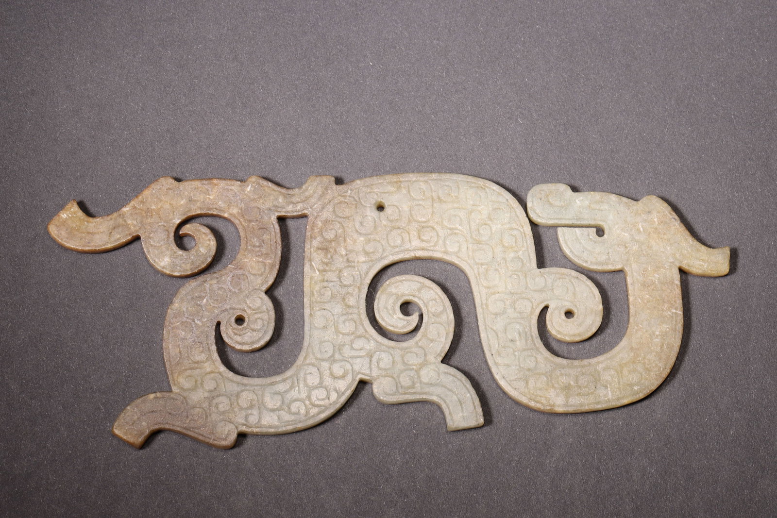 A JADE S-SHAPED DRAGON PENDANT (1 of 7)