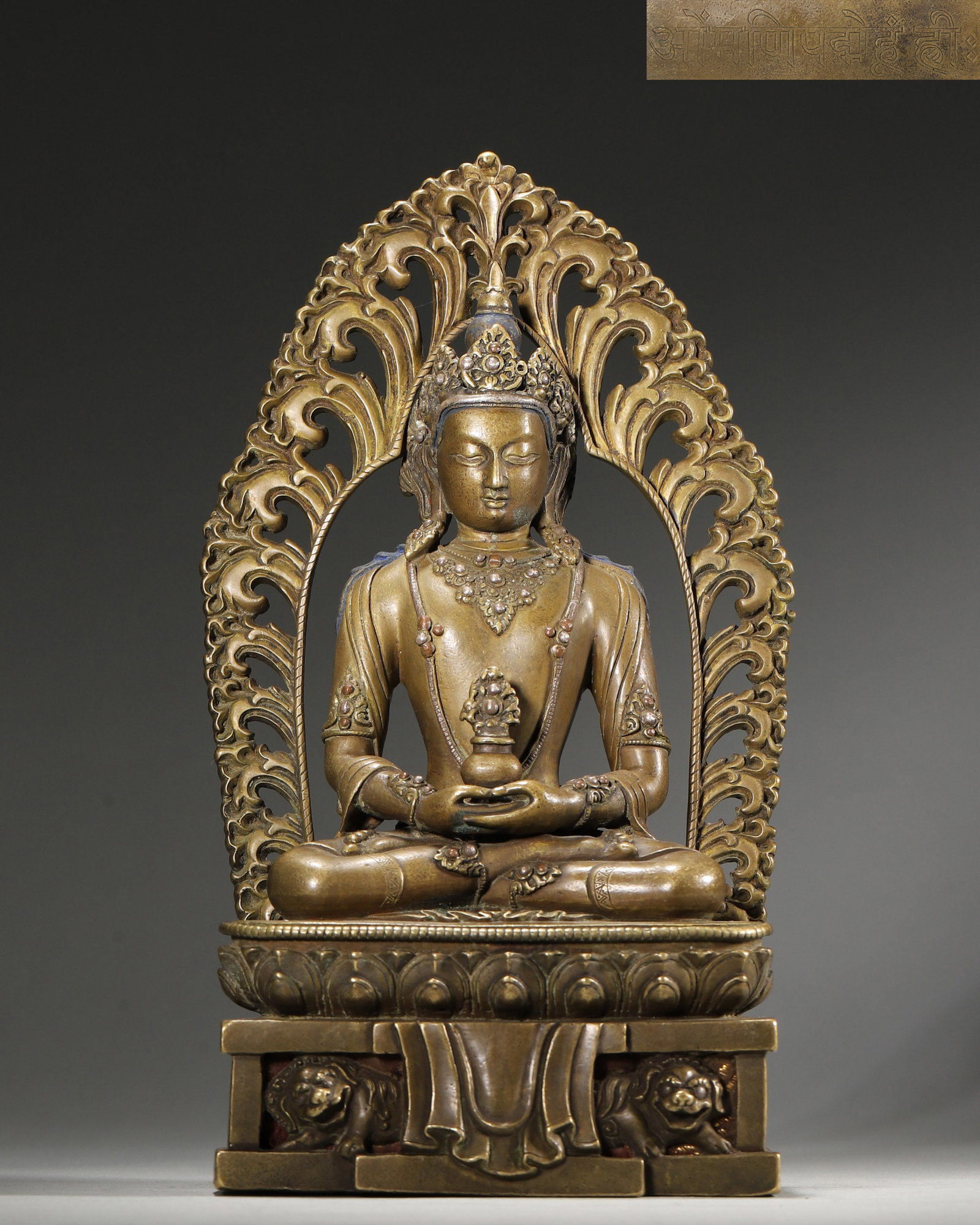 A TIBETAN-STYLE GILT-BRONZE FIGURE OF AMITAYUS (1 of 8)