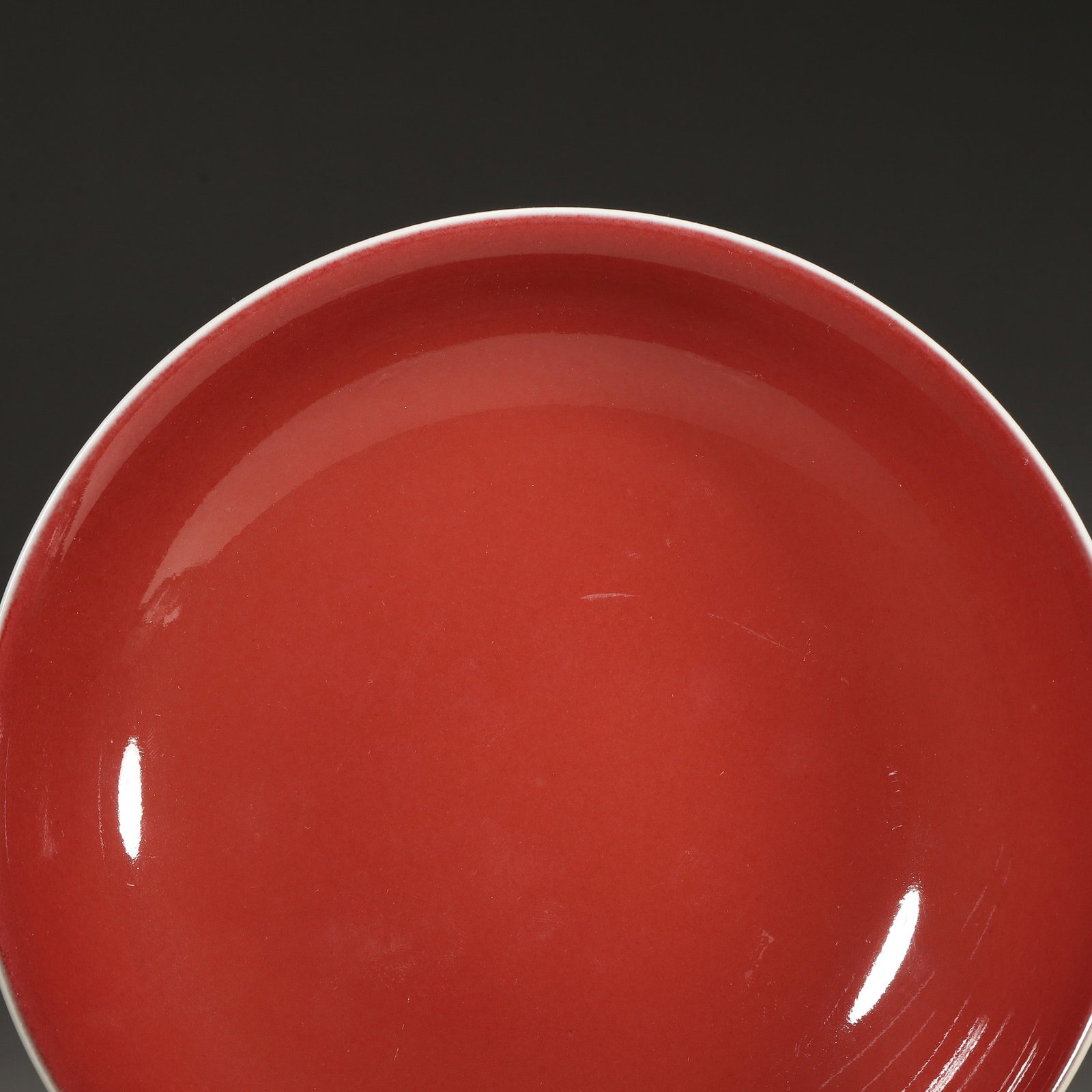 A COPPER-RED-GLAZED DISH - 2