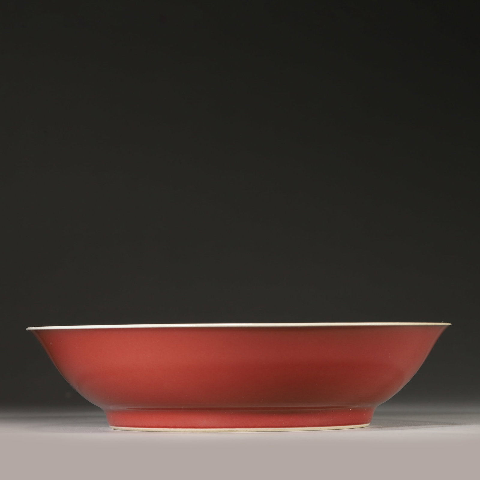 A COPPER-RED-GLAZED DISH - 3