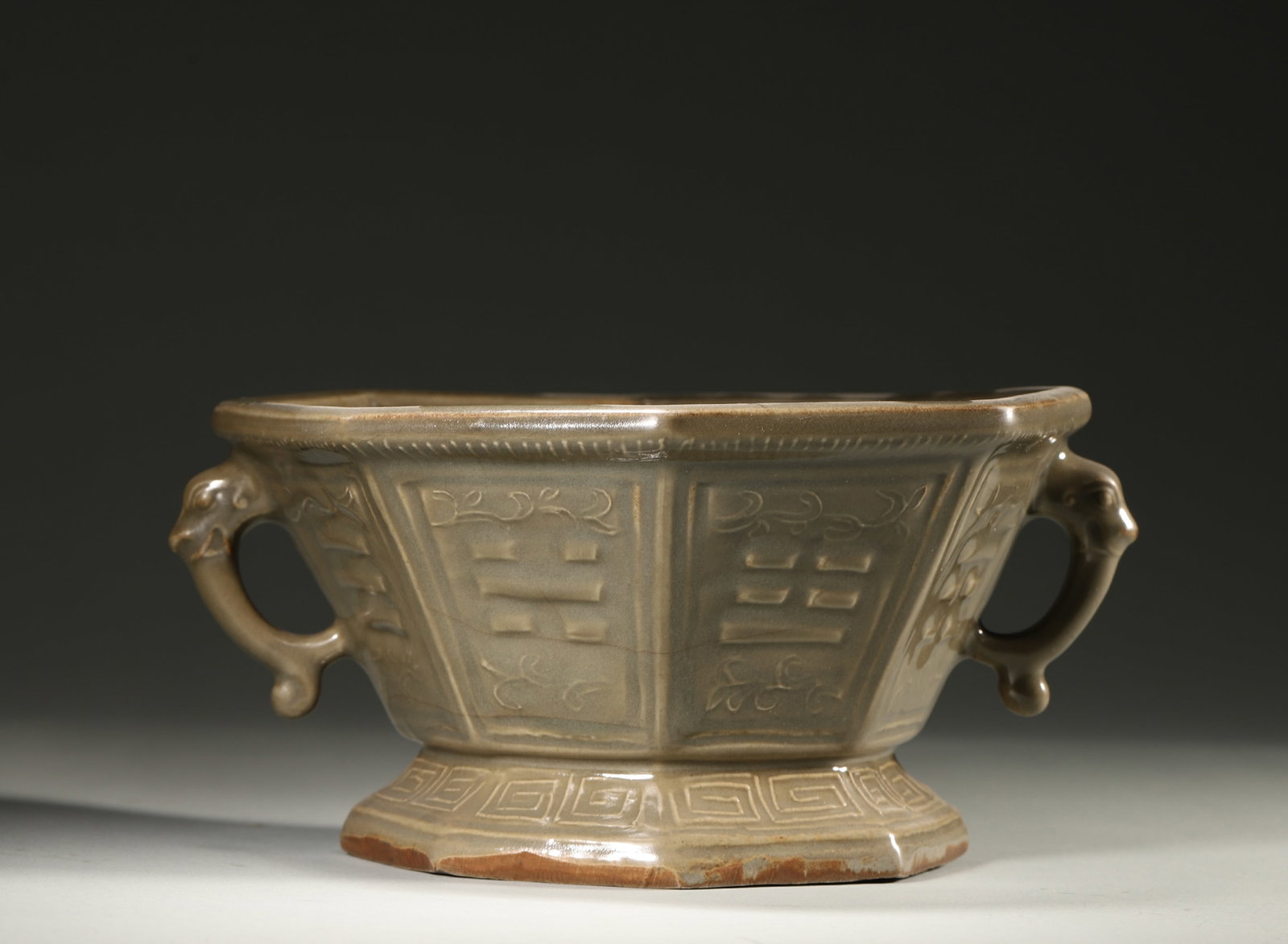 A LONGQUAN-TYPE CELADON OCTAGONAL CENSER WITH BAGUA AND BEAST HANDLES (1 of 5)