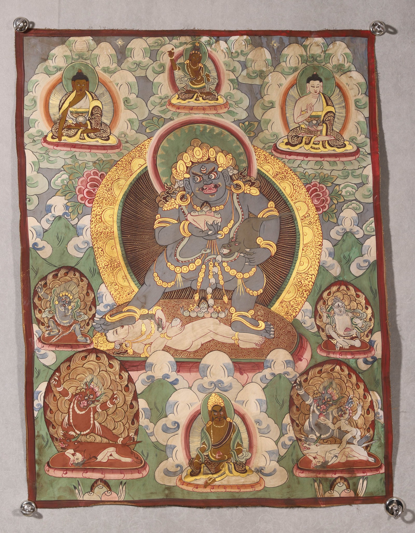 A BLACK JAMBHALA THANGKA (1 of 5)
