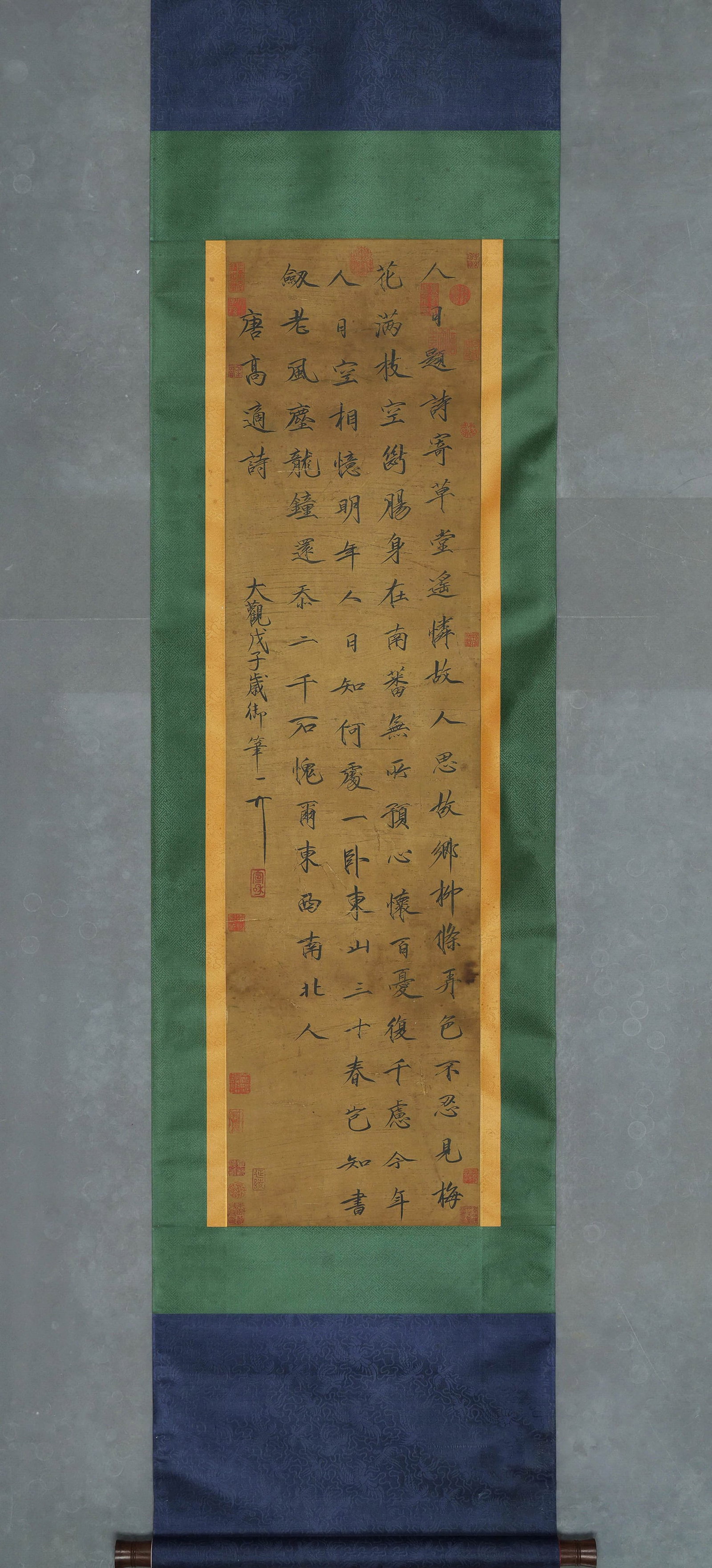 HUIZONG EMPEROR, ATTRIBUTED TO, RUNNING-SCRIPT CALLIGRAPHY, HANGING SCROLL: Attributed to Emperor Huizong. Calligraphy in ink on silk, hanging scroll, transcribing a Tang poem. The work bears multiple seals and is mounted with two-color silk borders. Dimensions: Image: 131 x 