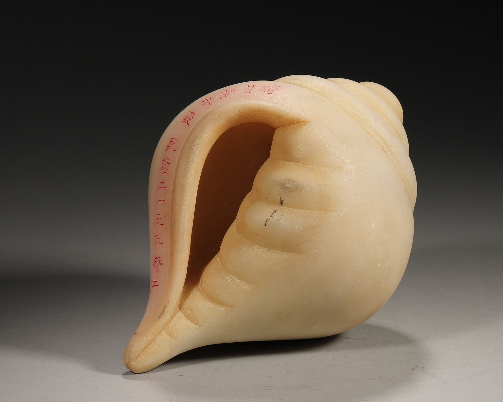A WHITE JADE CONCH-FORM ORNAMENT (1 of 8)