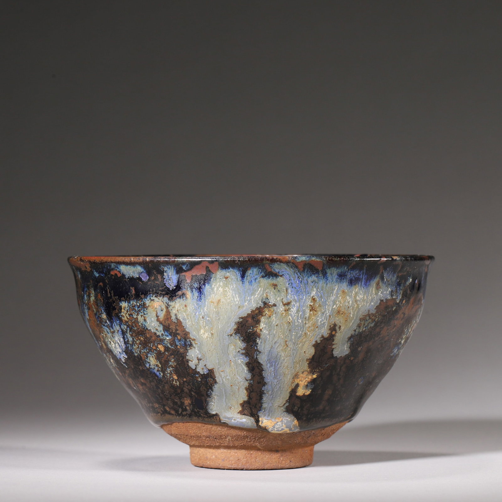 A VARIEGATED BLACK-GLAZED 'GONG YU' JIAN-STYLE TEA BOWL (1 of 7)