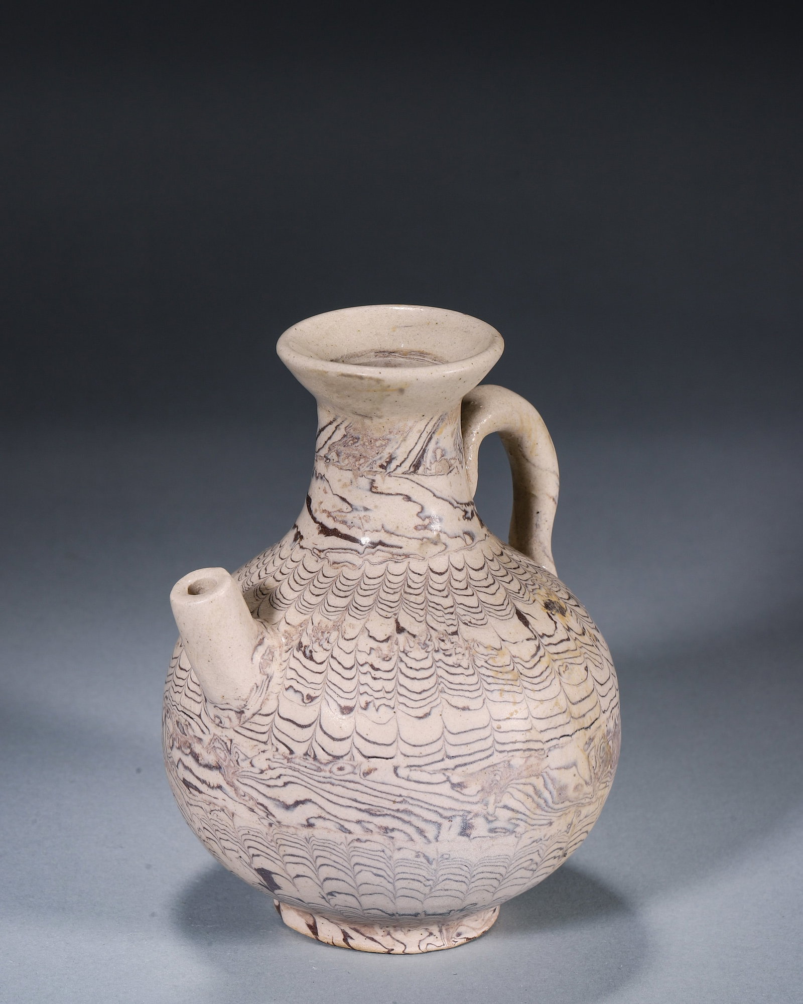 A MARBLED-CLAY EWER - 3
