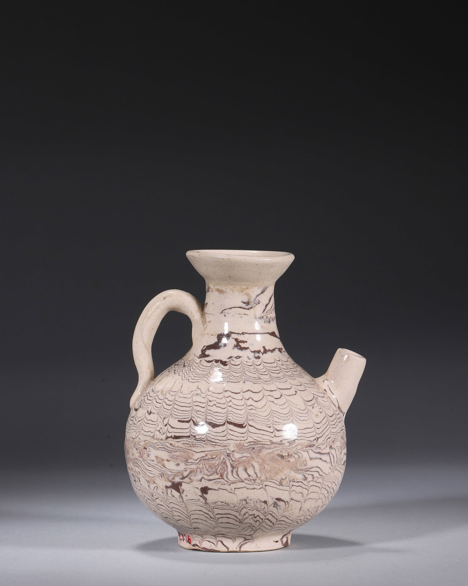 A MARBLED-CLAY EWER - 4
