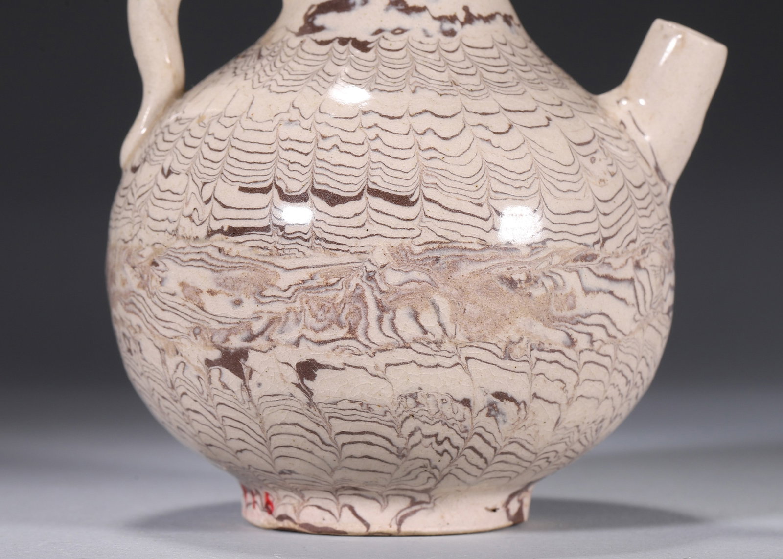 A MARBLED-CLAY EWER - 6