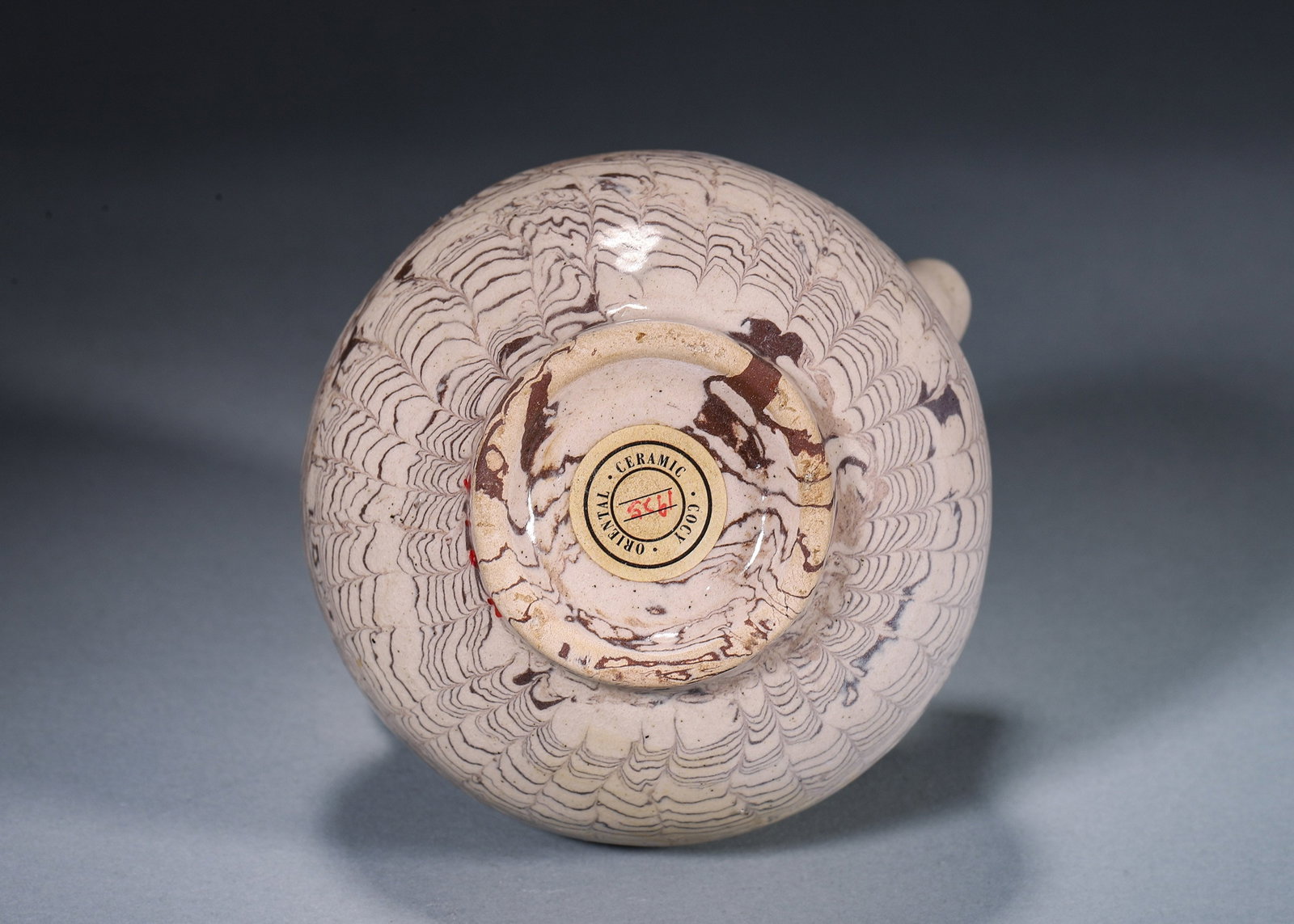A MARBLED-CLAY EWER - 7