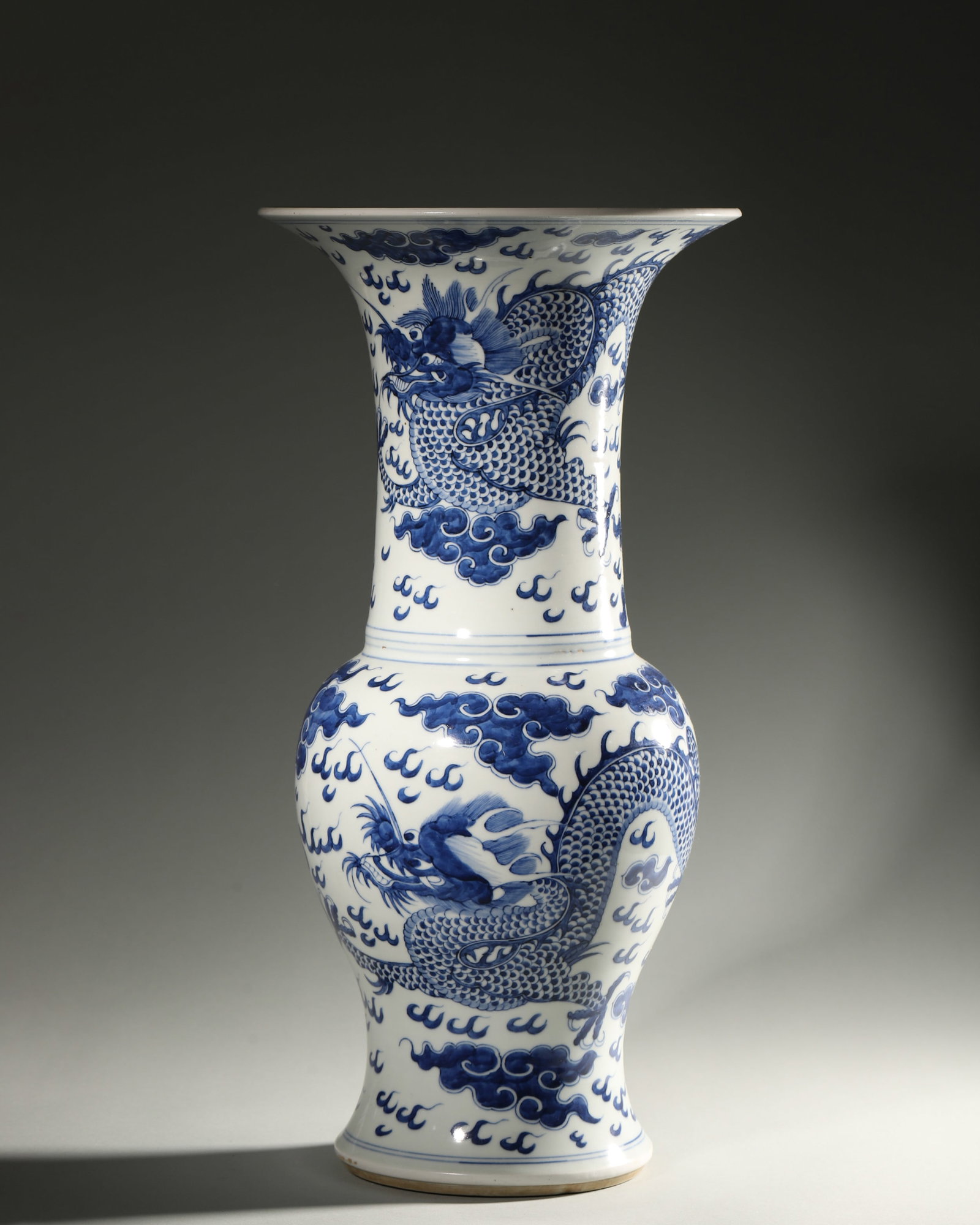 A BLUE-AND-WHITE 'DRAGON AND CLOUD' PHOENIX-TAIL VASE (1 of 6)